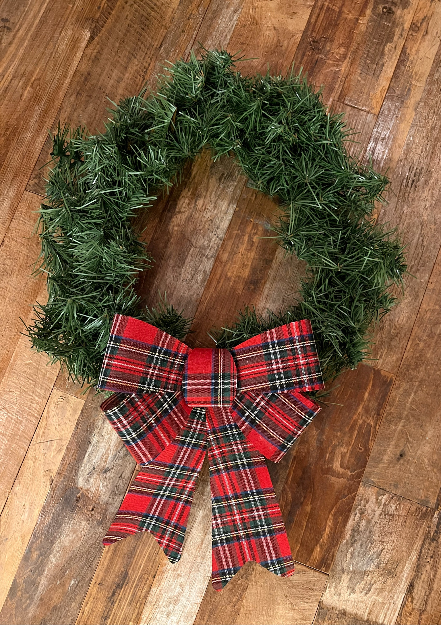 Affordable Christmas wreath ($3.98)  and bow ($4.98). I bought these for my exterior windows. 🎄

#LTKHome #LTKHoliday #LTKSeasonal