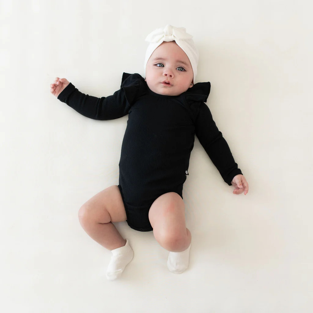 Ribbed Long Sleeve Ruffle Leotard in Midnight | Kyte BABY