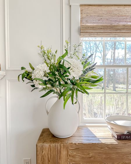 Artificial flowers and greenery, stems, vase, book, window shades. 

#LTKhome #LTKSeasonal #LTKsalealert