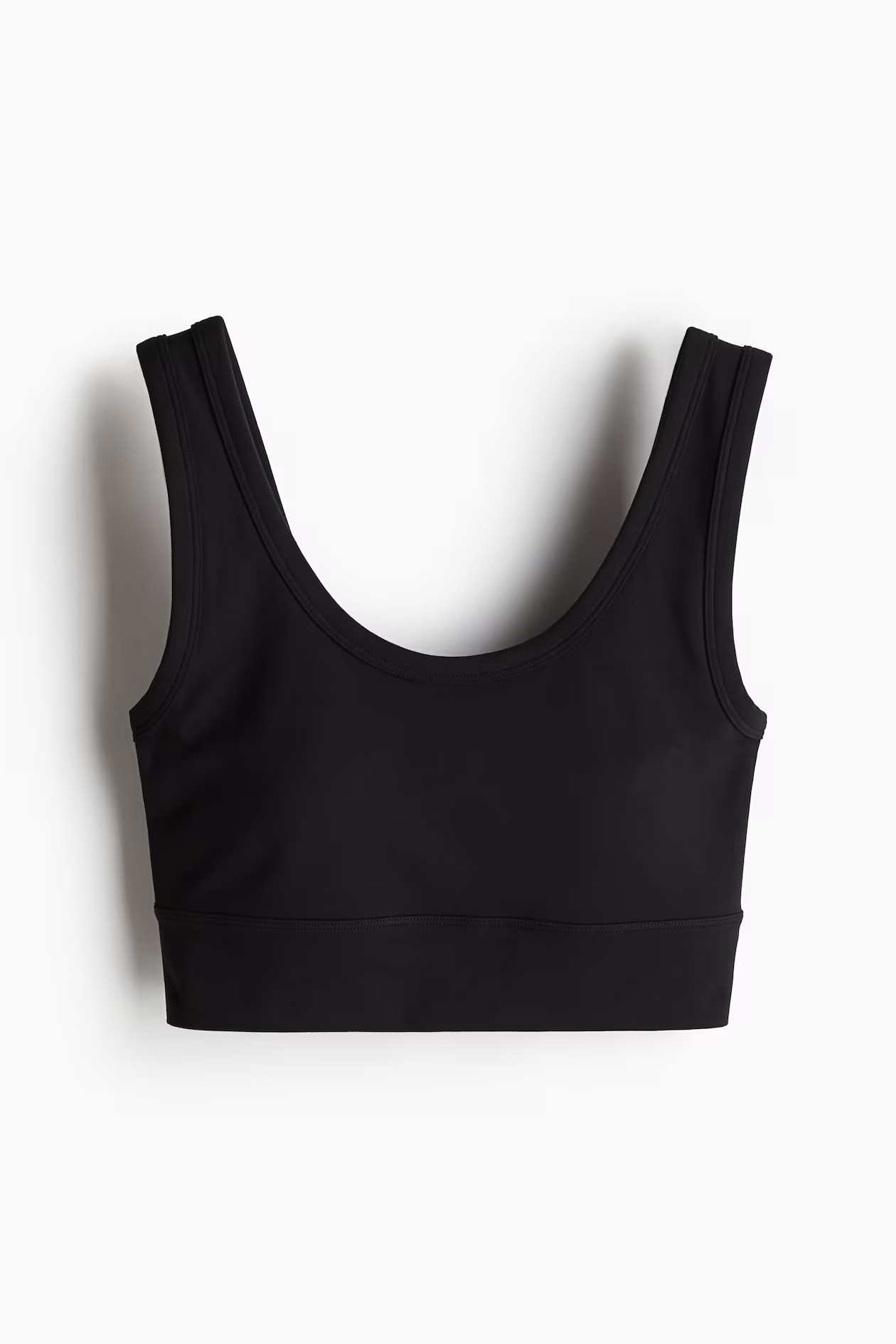 Medium Support Sports bra in SoftMove™ - Black - Ladies | H&M GB | H&M (UK, MY, IN, SG, PH, TW, HK)