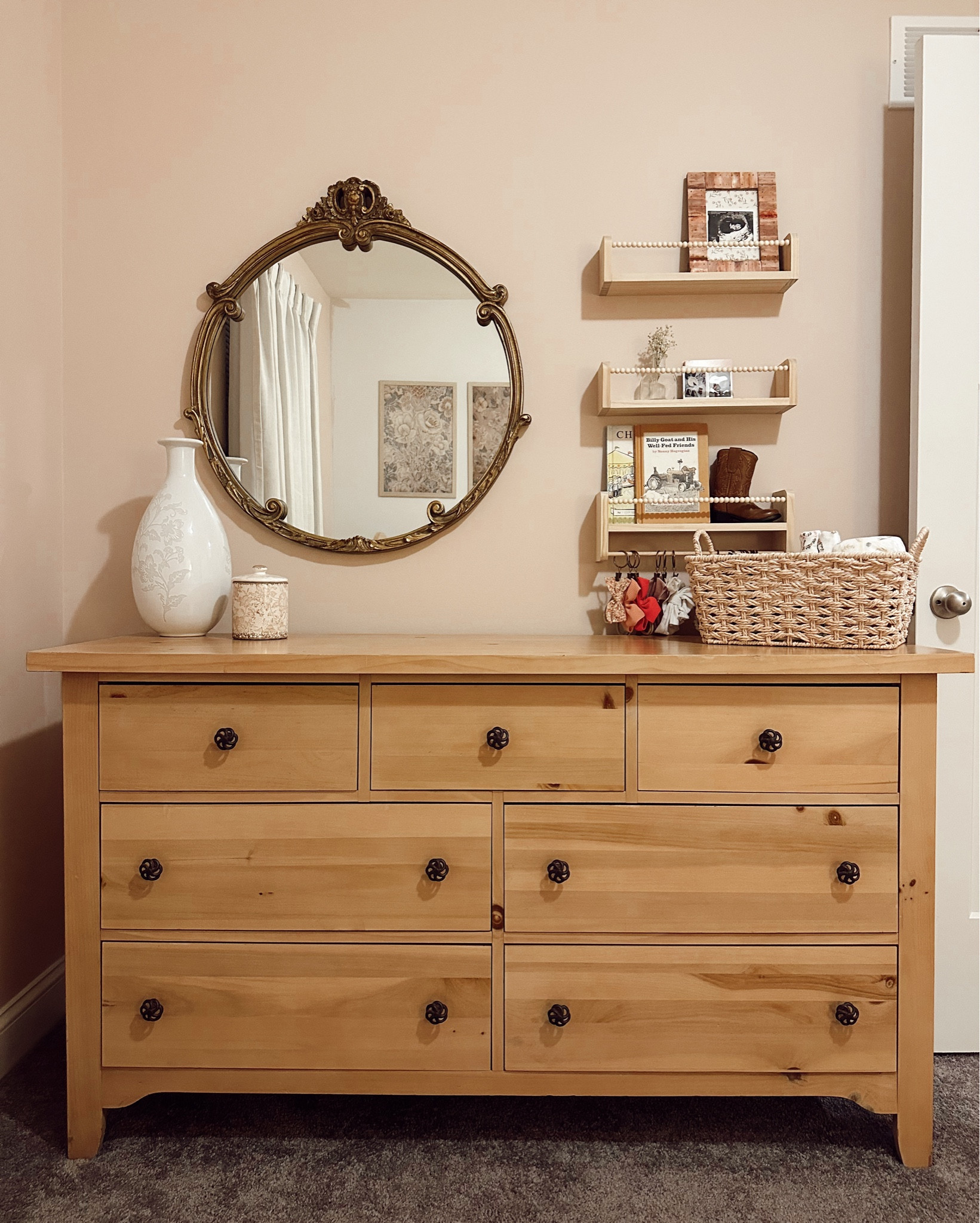 nursery dresser wall decor - 💓🪝🪞✨🎀 got my great grandmas mirror up + some of my dads baby books up there 🥹 I’m linking what we will put on the shelving but for now I just put up a few little nick knacks to get a visual! Also can’t wait for our knobs to come in from Etsy! 🥹💓🕊️ this rooms coming along + oh so peaceful 🪷

#LTKBaby #LTKKids #LTKHome