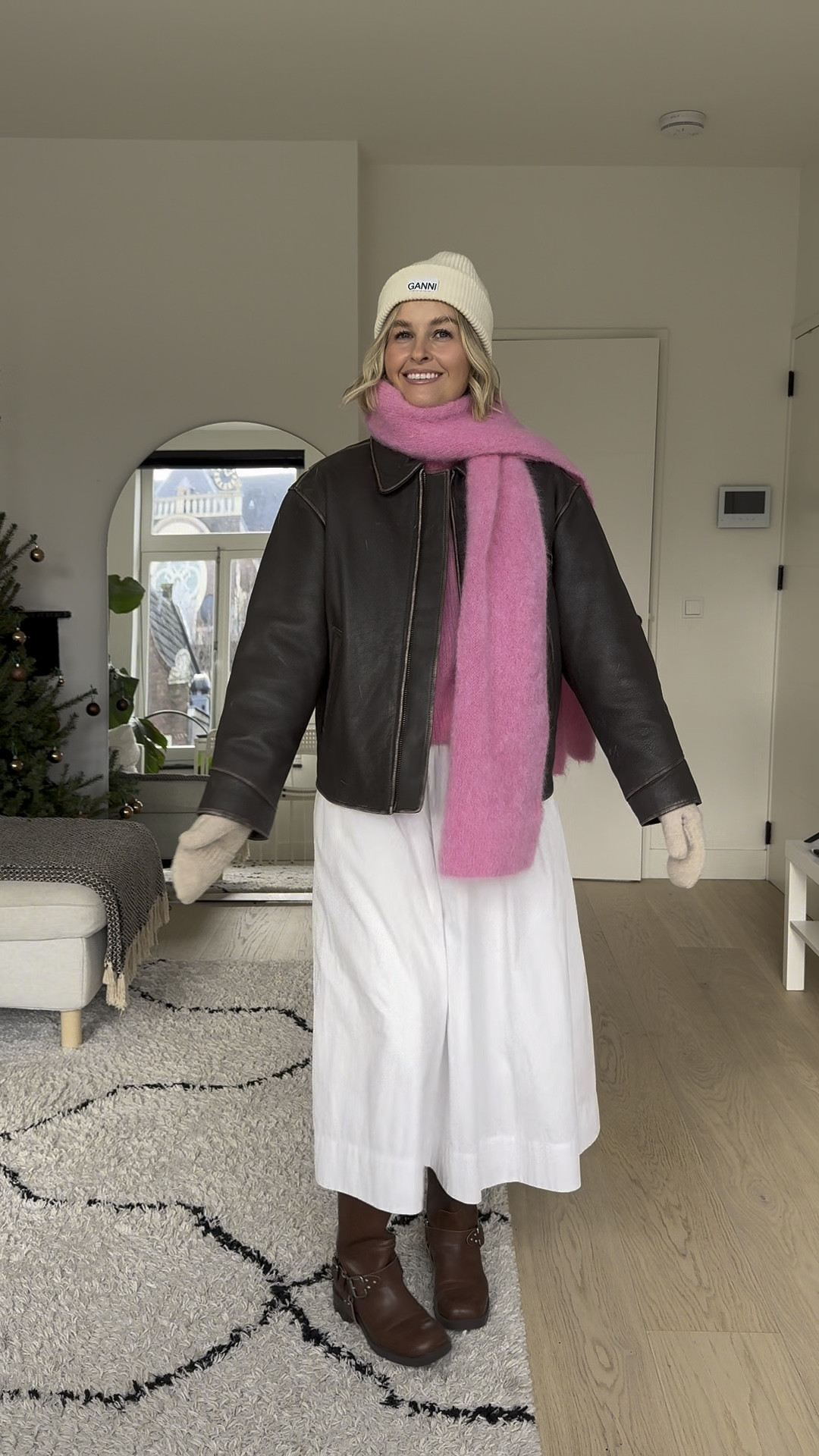 Layering for winter!

White maxi skirt: NAKD (UK10)
Pink scarf & jumper: surprise Paris (T4)
Brown biker boots: Stradivarius (old)
Brown leather jacket: mango (old)
GANNI beanie 
Thermals & mittens: Uniqlo 

#LTKuk #LTKwinter #LTKeurope