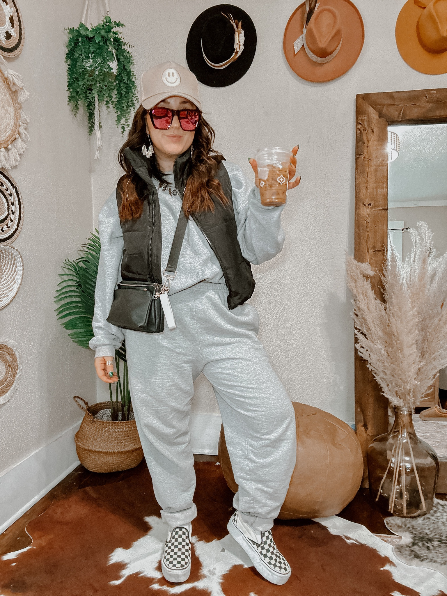 Winter sweats outfit! How to style sweats in the winter outfit series! Wearing L in sweatpants and XL in sweatshirt (for super oversized fit). Ricky band for crop in sweatshirt. Medium in black crop puffer vest with pockets. Platform checkered vans run TTS. Smiley trucker hat. Cute black belt bag and gold boho jewelry 

#LTKMostLoved #LTKSeasonal #LTKstyletip