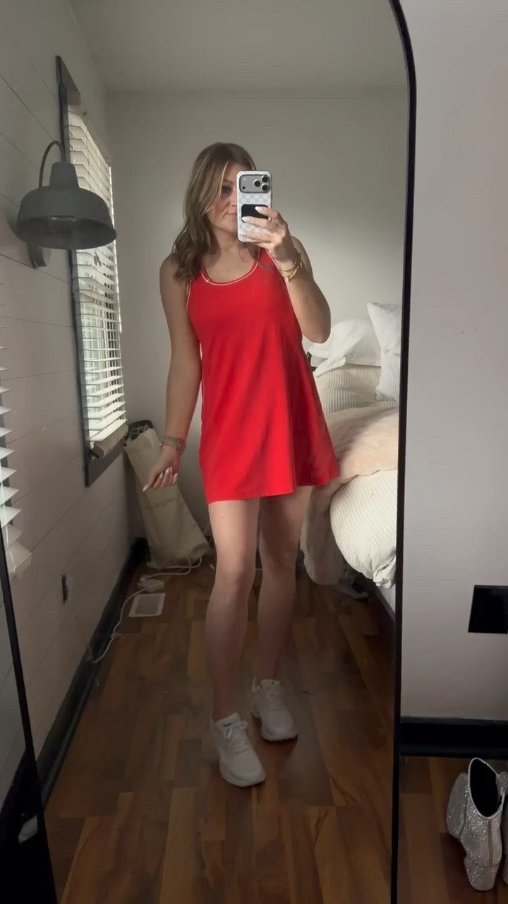 This red athletic dress is such an easy throw on outfit for busy days. It’s comfortable, flattering, and perfect for walks, errands, or travel days while still looking cute and put together.

red athletic dress, tennis dress outfit, sporty casual outfit, athleisure dress style, travel day outfit, casual sporty dress, comfortable summer outfit, everyday activewear style, running errands outfit, easy throw on outfit, SavannahK

#LTKActive #LTKootd #LTKmomlife