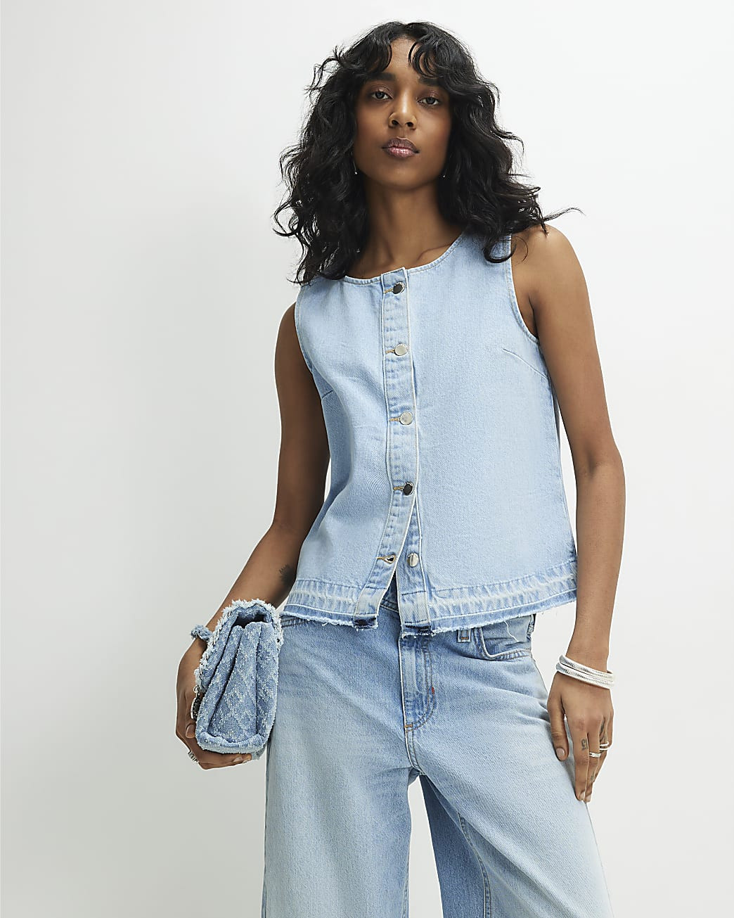 Blue Denim Sleeveless Raw Hem Top | River Island UK & IE