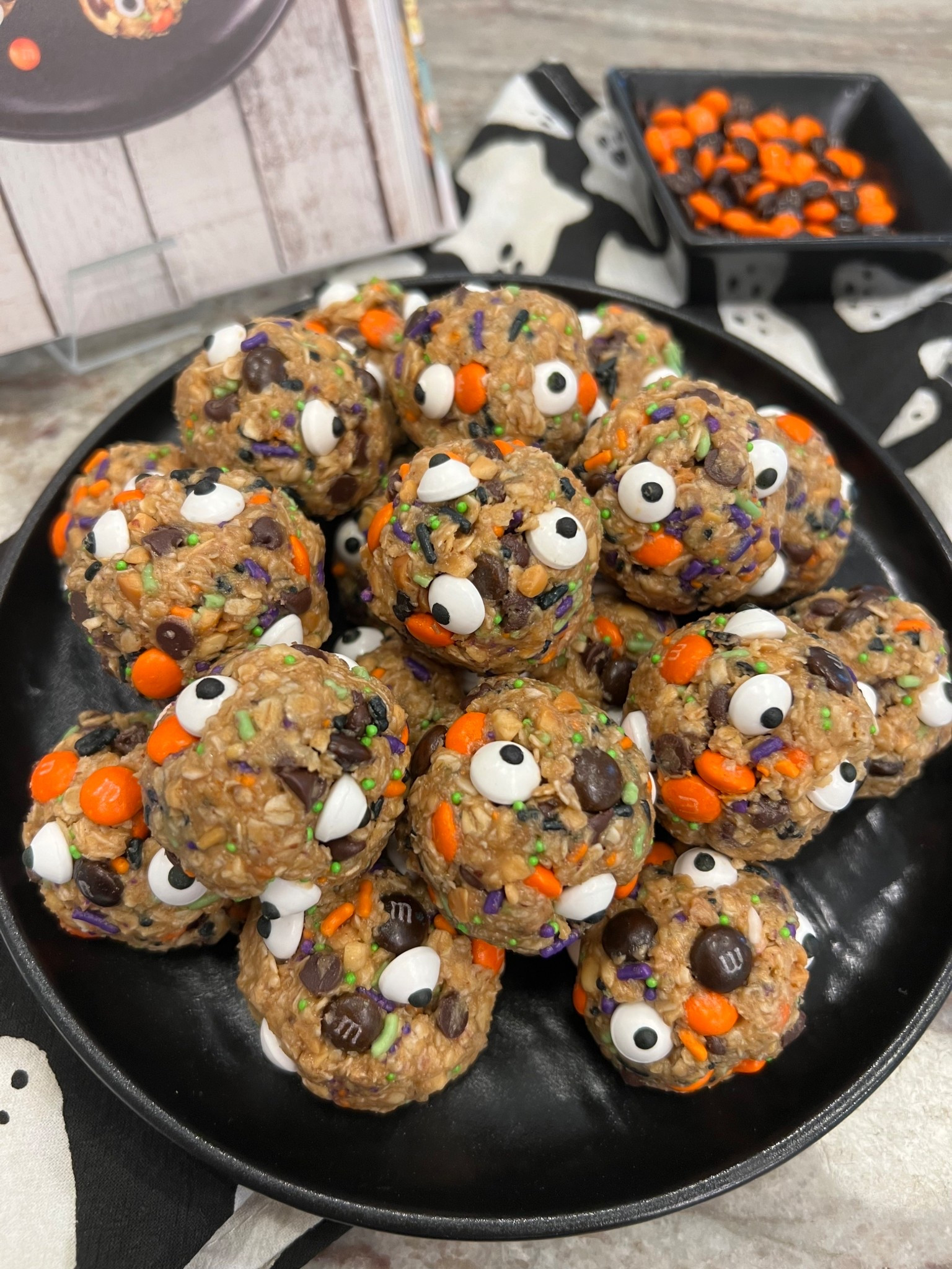 Monster Cookie Balls are Halloween treat loaded with all the yumminess of a good monster cookie- peanut butter, oats, honey, and chocolate. Add on candy eyeballs and you’ll be glad you have these little monsters hiding away in your fridge!

#LTKHome #LTKParties #LTKSeasonal