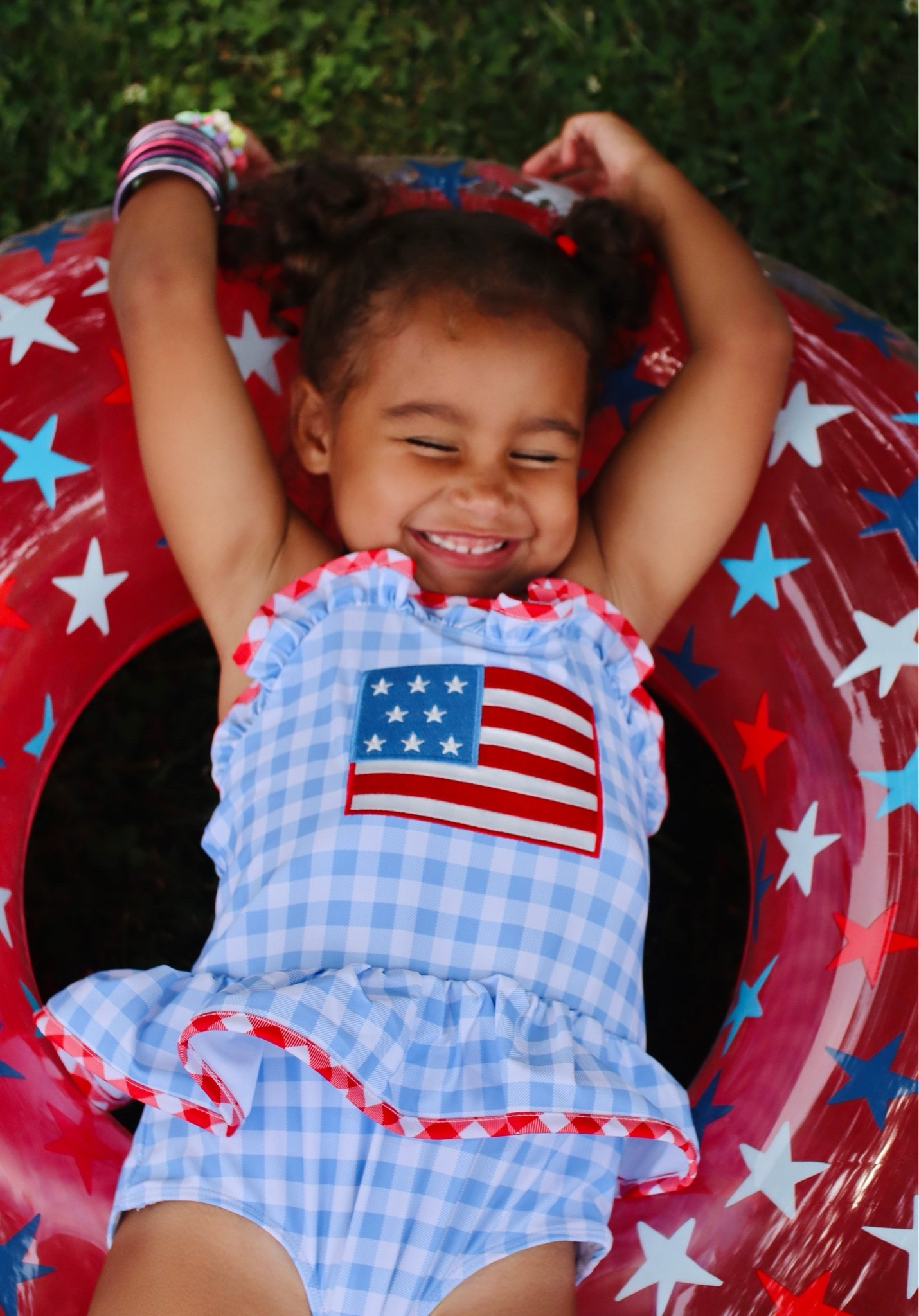 American girl loving life on the 4th of July … rounding up kids summer bathing suits on sale

#LTKootd #LTKSwim #LTKKids