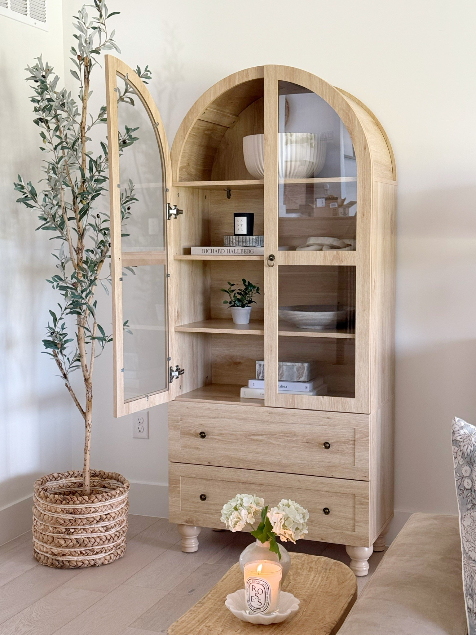 This arched cabinet adds the perfect touch of warmth and charm—styled with soft neutrals, subtle textures, and a hint of spring freshness!

#LTKHome #LTKStyleTip #LTKSeasonal
