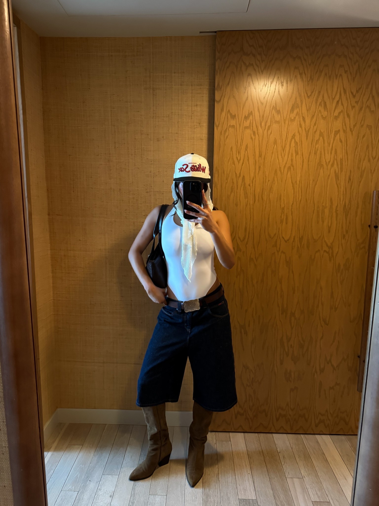 street style outfit💕 dark blue washed jorts, brown silver belt, brown suede kitten boots, white body tank, white headscarf, with brown bag & white Red Sox hat

#LTKBeauty #LTKSpringSale #LTKStyleTip