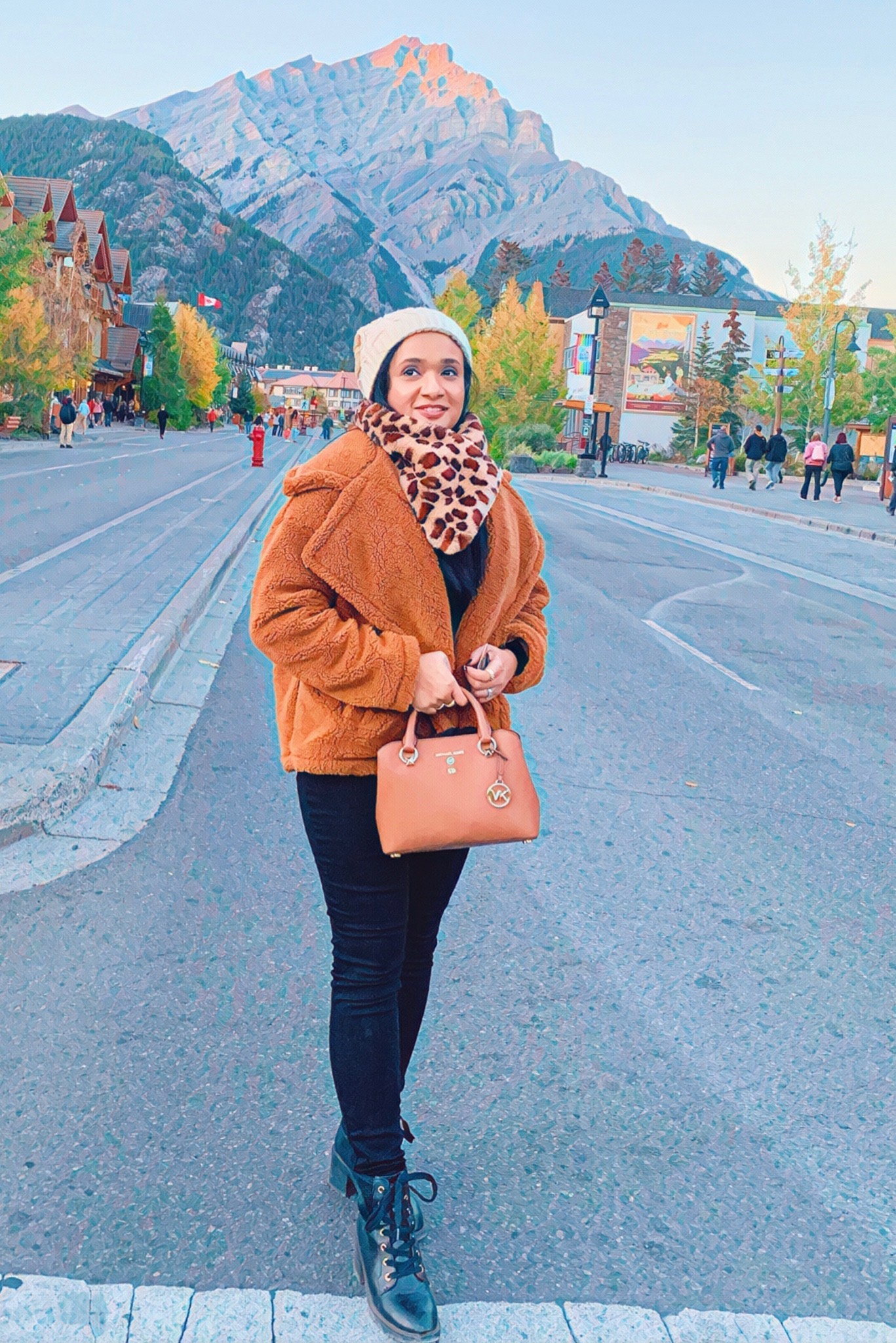 A winter chic look. 
#Teddycoat #leopardscarf #Beigebeanie #blackjeans #Blacktee #Ankleboots #Smalltotebag

#LTKstyletip #LTKtravel #LTKSeasonal
