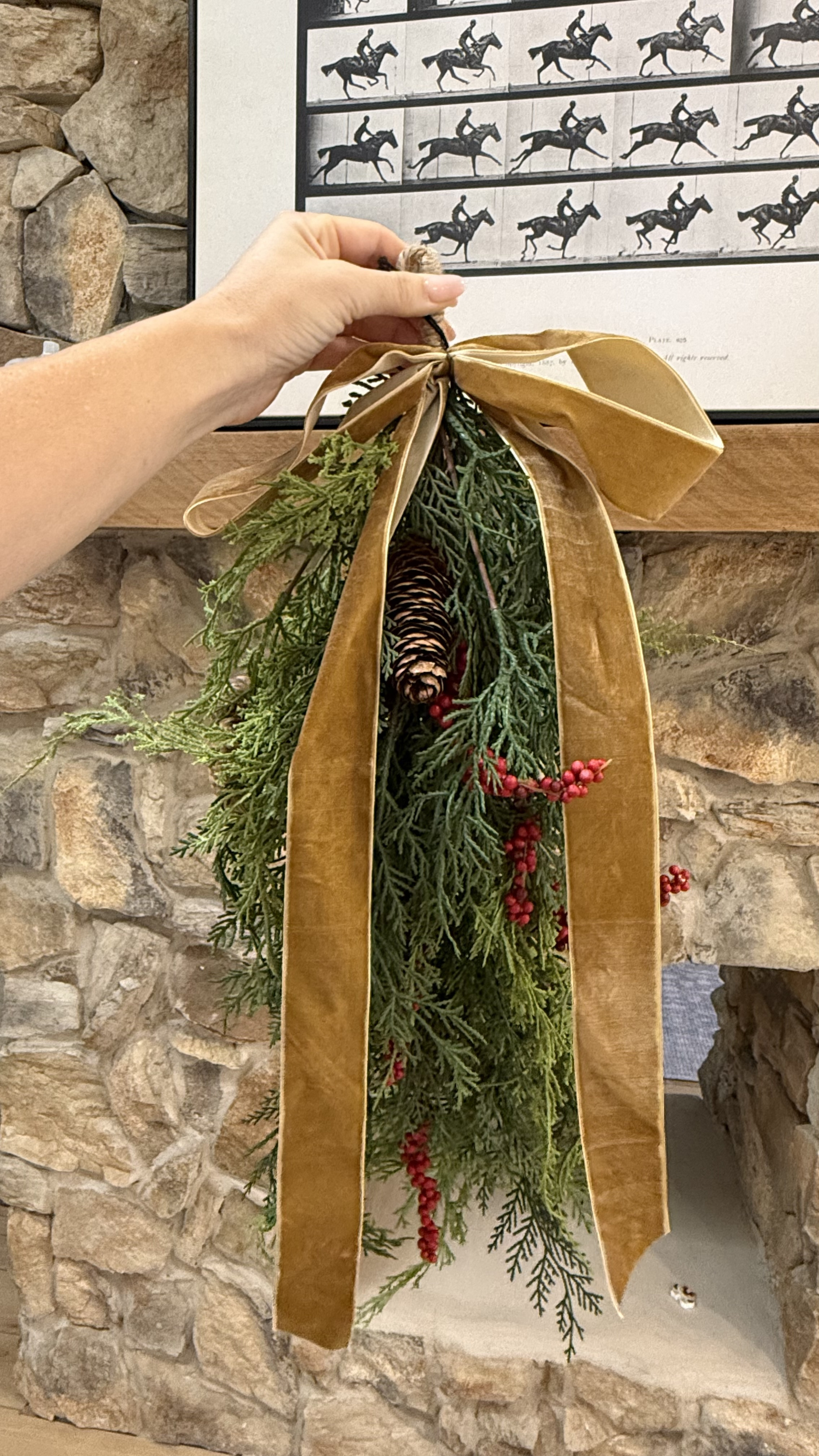 absolutely stunning! I’m going to be hanging this on our mirror near our entryway! #christmasdecor #christmas #garland #christmasgarland #christmasdecor #entrydecor #entrywaydecor #christmasentryway #christmasentrydecor #bow #christmasbow 

#LTKHoliday #LTKHome #LTKFindsUnder50