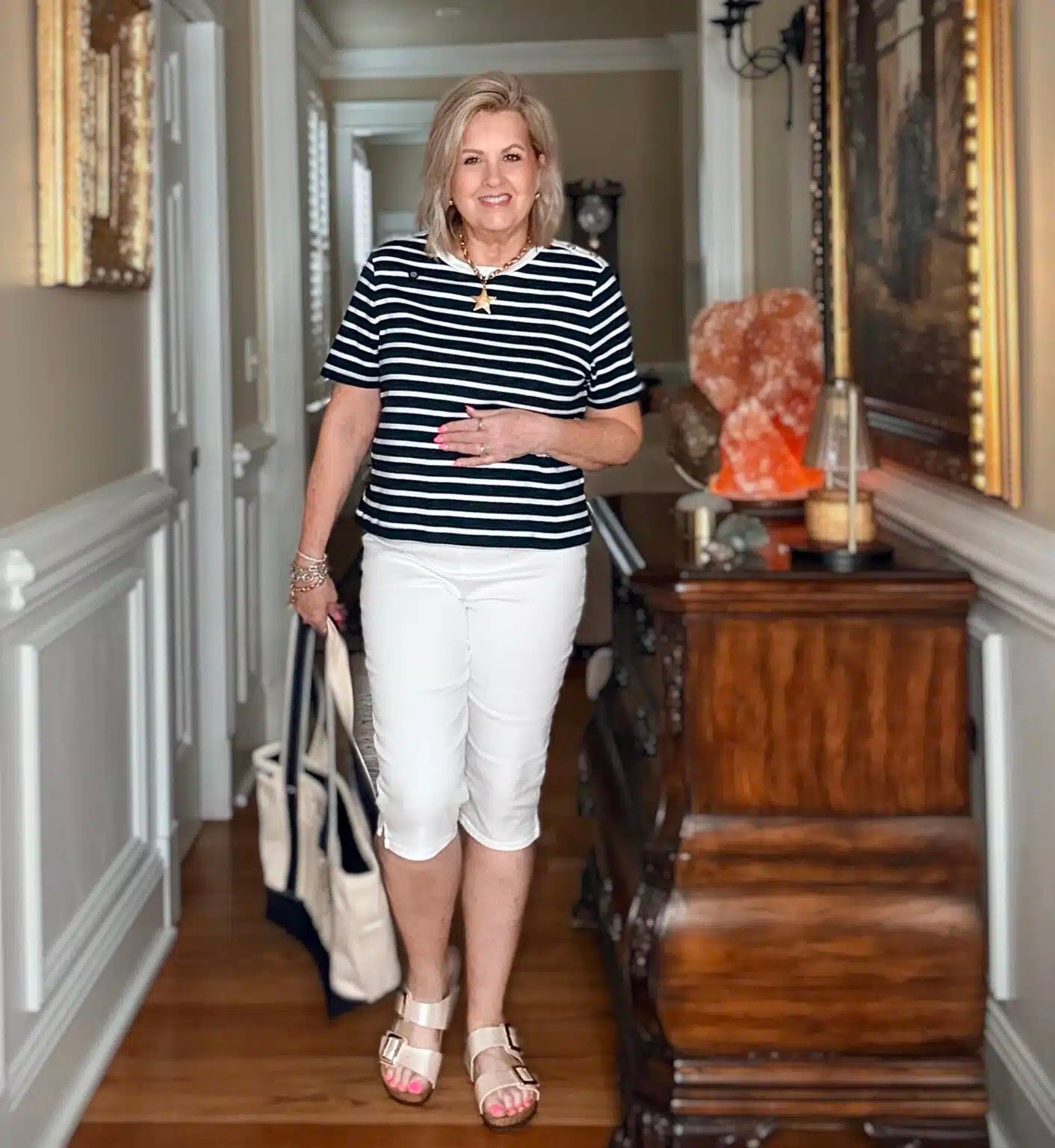 Navy and white for Memorial Day! Add pops of red to complete the look. My top is a size large and pull on capris are a size medium.

#LTKOver40 #LTKootd #LTKWorkwear