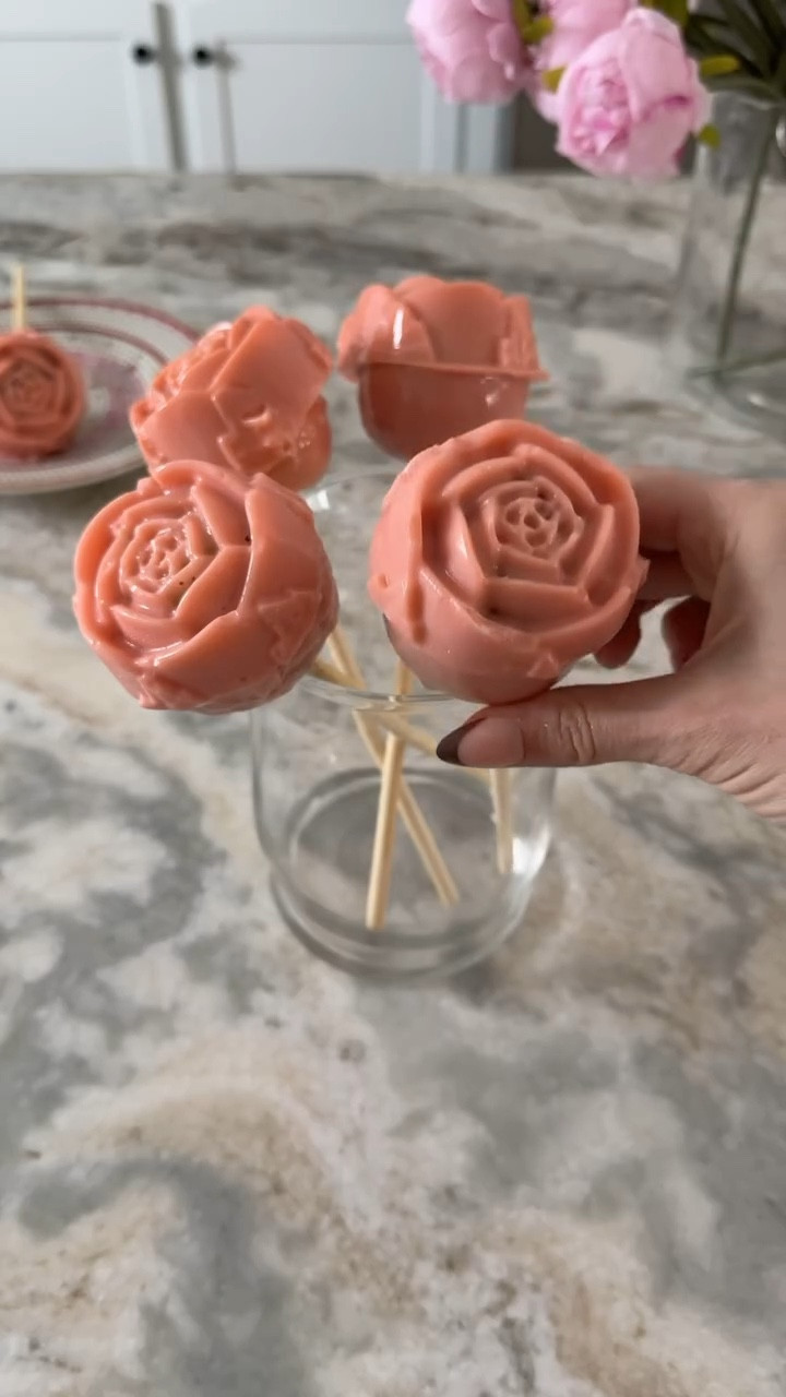 Rose Candy Apples 🍎🌹 I made these for Halloween last year and thought they’d also be perfect for valentines! Which is your favorite- pink or red? 

INGREDIENTS:
miniature apples
Apple sticks
4 cups granulated sugar
1 cup corn syrup
11/2 cups water
pink food coloring
white food coloring 

1. Place the sugar, corn syrup, water, and pink food coloring into a large saucepan and stir to combine.
2. Allow the mixture to come to the boil, removing once it reaches 300F, then stir in the white food coloring- you will need to check this with a candy thermometer. Please be careful as this is very hot! 
3. Press the sticks into the apples and dry each one as much as possible to avoid bubbles in the coating. 
4. Spoon a small amount of syrup into the bottom of the mold to coat, then dip each apple into the hot candy syrup and press into the rose silicone mold. Allow apples to cool and set. 

#valentines #valentinesday #vday #candyapples #easybaking #valentinestreats #galentines #easybaking