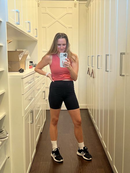 I bought this affordable Amazon workout top when I was pregnant to go over the bump, but I like it now just as much! It’s under $20 and comes in a bunch of colors. I’m wearing a small.

Biker shorts are Target and socks are Gym Shark. Tall socks are coming back in style yall!

#LTKstyletip #LTKfit #LTKunder50
