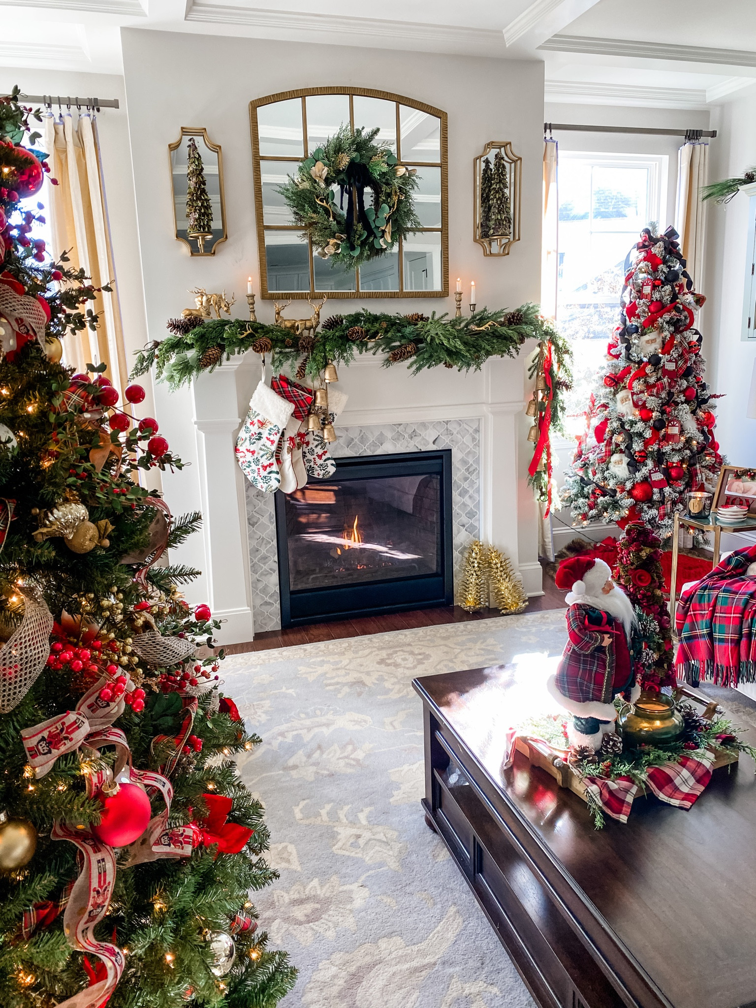 Christmas living room decor is here! Faux Christmas trees garland sconces mirror throw blankets and pillows deer stockings etc! 

#LTKSeasonal #LTKHoliday #LTKhome