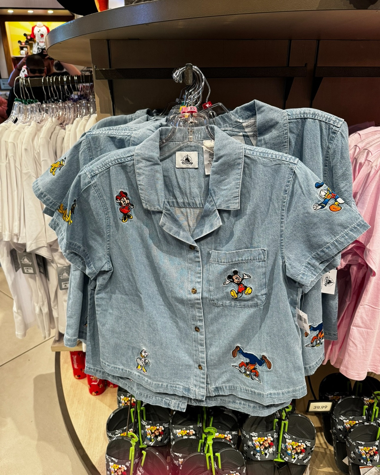 I’m LOVING the return of 90s styles and denim at the parks. My millennial heart is so happy seeing these shirts, especially this short sleeve one. Perfect accessory to throw on any outfit, especially for summer! All now on disneystore.com 💙

#LTKstyletip #LTKfindsunder100 #LTKGiftGuide