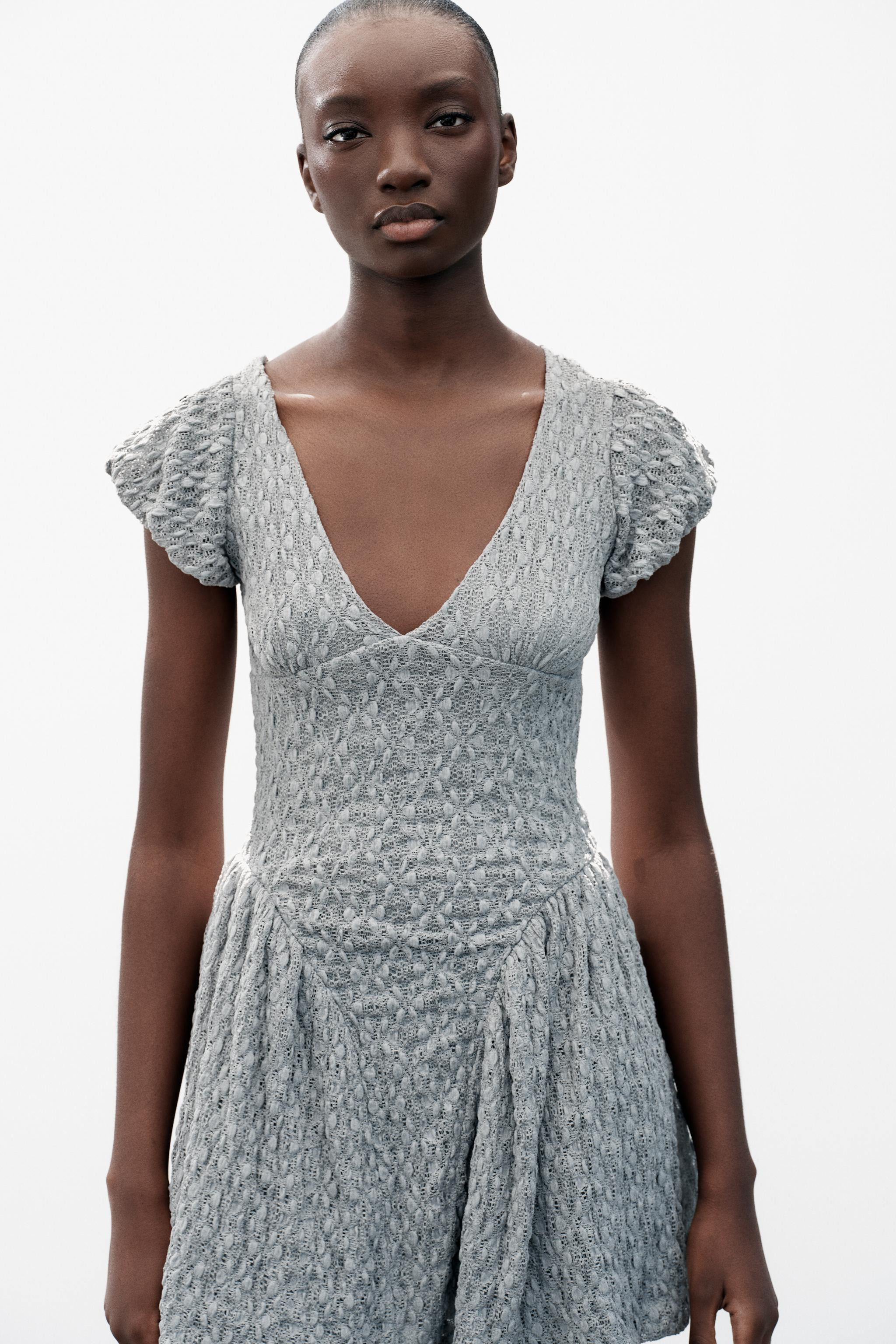 Dress with V-neckline and short balloon sleeves. Tonal combination lining. | Zara US