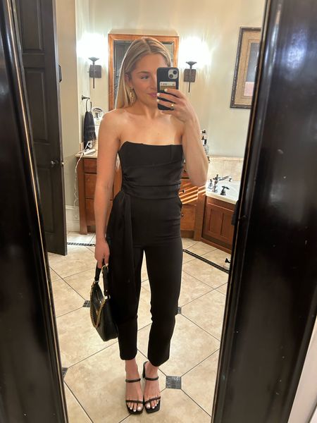 Something that everyone needs in their closet: a black jumpsuit! 🖤 I love love love this one! So classy and I could wear to so many events! Fits great, if I were taller I would size up for length! It comes in a light pink and an ivory as well. the ivory would be perfect for a bride! I am in an XS. Under $80! I linked similar options of various prices! I paired with black heels and my fave black purse! Did good accessories! 

#LTKstyletip #LTKfindsunder100 #LTKshoecrush