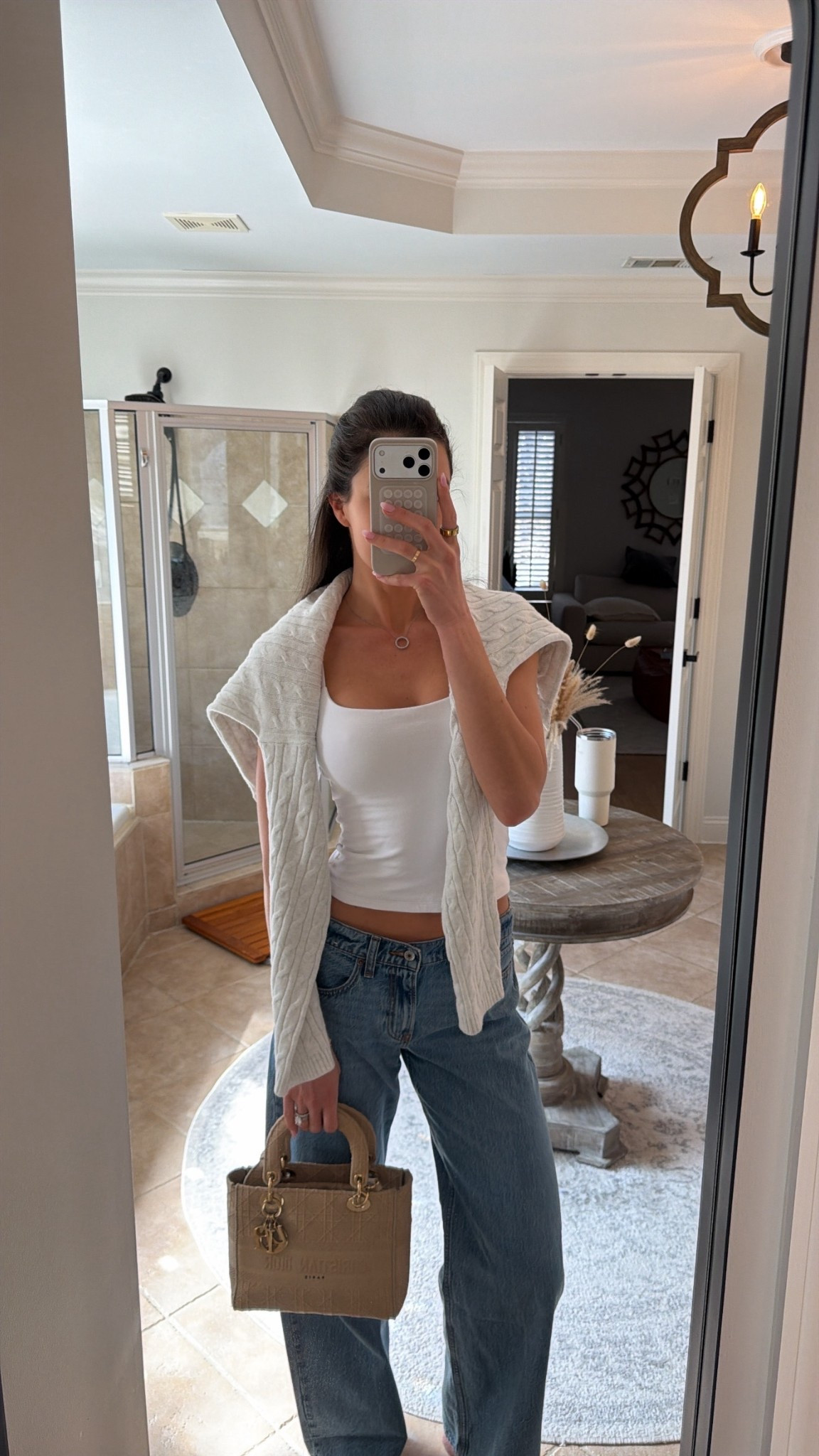 Outfit of the day! Abercrombie low rise jeans in size 26 long. Bra-free tank in size xs and I sized up to a large in the sweater. 

#LTKootd