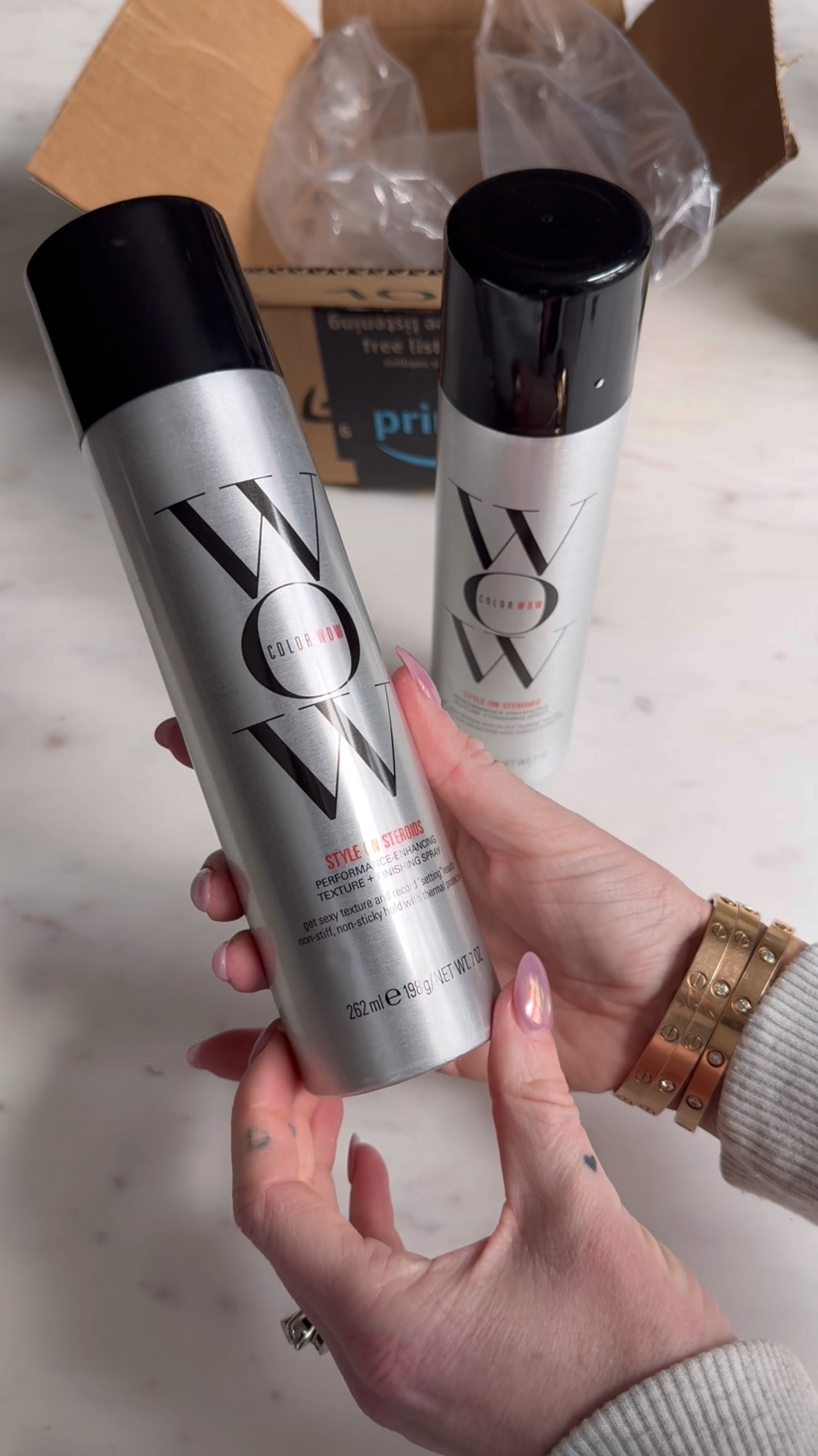 Holy grail hairspray 
Color wow style on steroids texturizing spray 