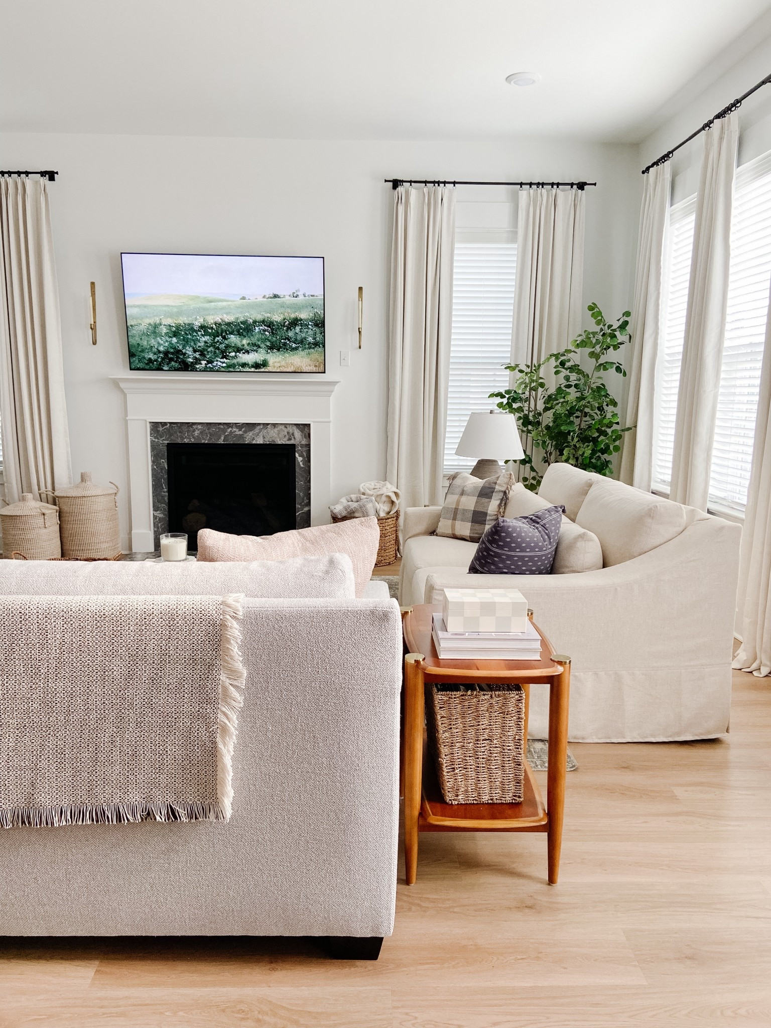 The return of calm 💫
#livingroom #sofa #loveseat #curtains #fireplace 

#LTKHome