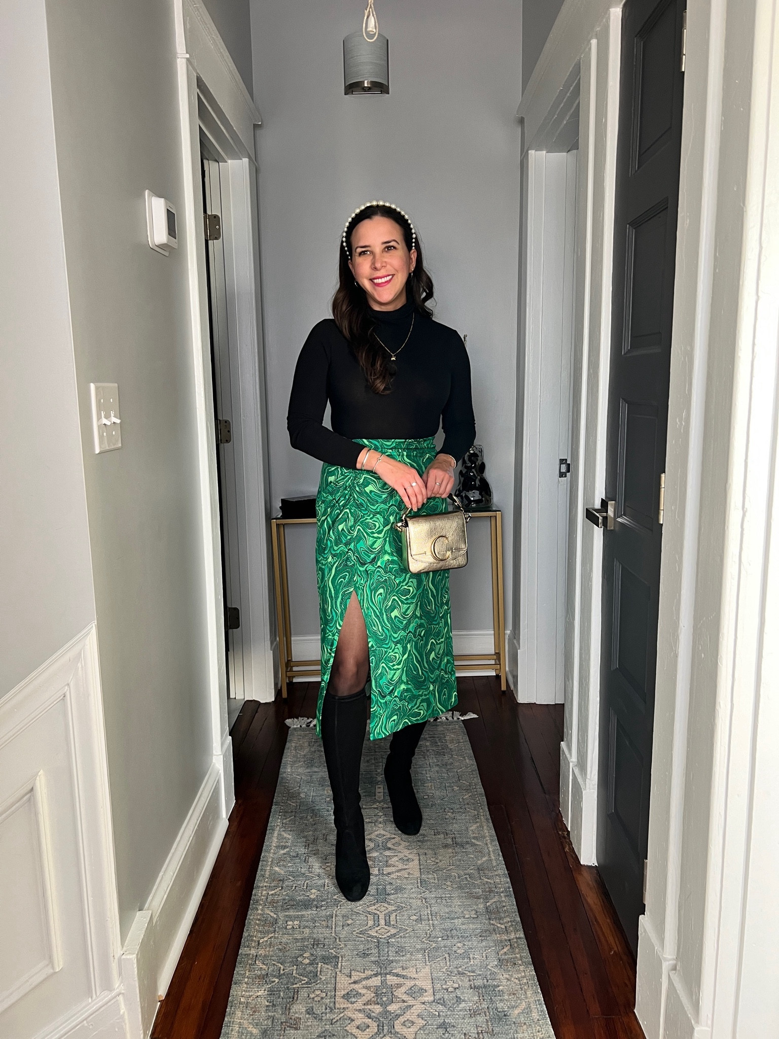 Green printed midi skirt + a black turtleneck + knee high boots & a fun headband is an easy holiday party outfit. 

DVF skirt. Rent the runway. Stuart weitzman boots. 

#LTKSeasonal #LTKHoliday
