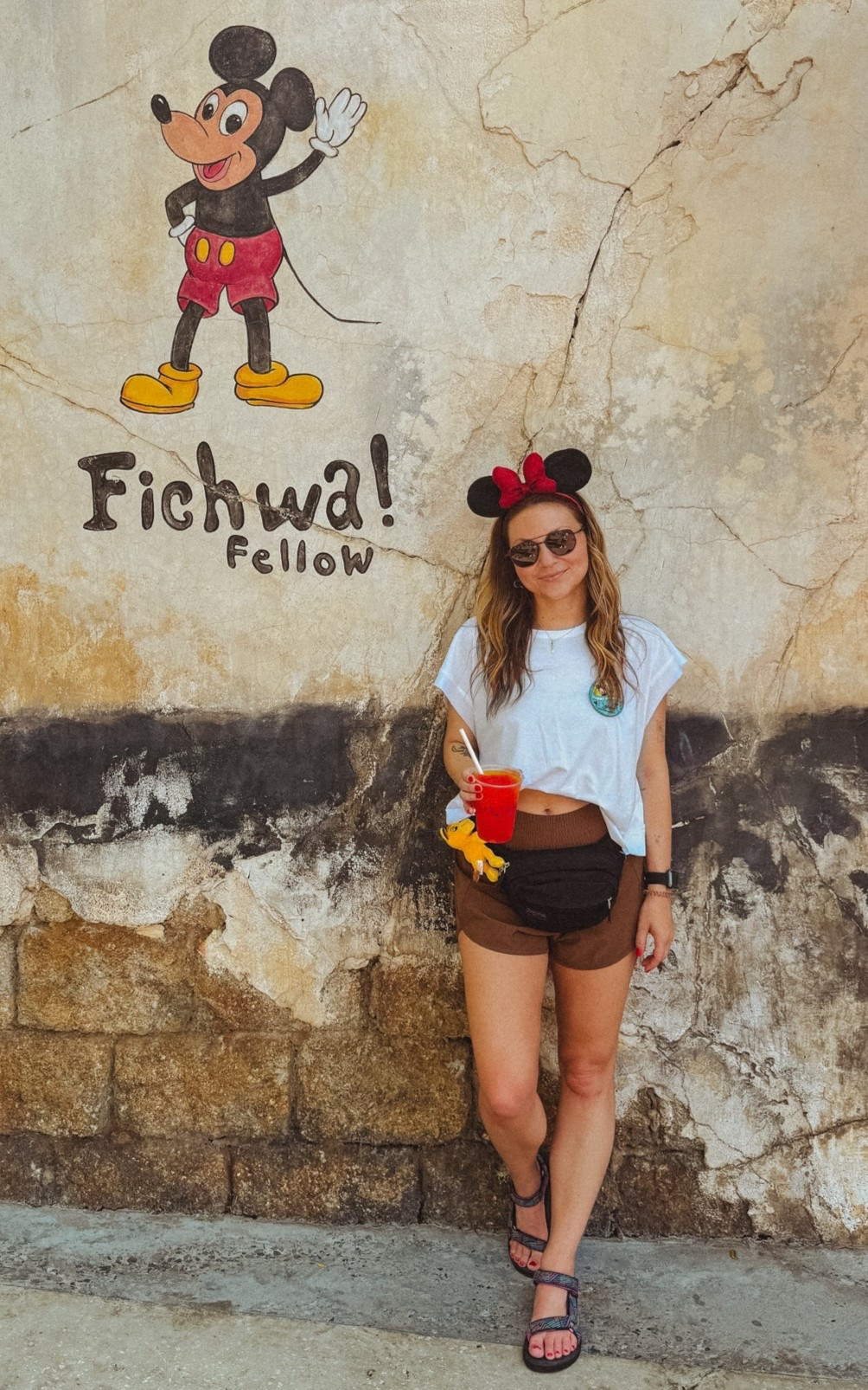 Simple Disney park OOTD for Animal Kingdom 🐭❤️🌳🦒 A comfy, breathable outfit for a hot park day! Open-back tee, running shorts, Minnie ears & my favorite park sandals ✨ #DisneyOOTD #DisneyStyle #DisneyOutfit #DisneyWorld #DisneyParks #MinnieMouse #ParkOutfit