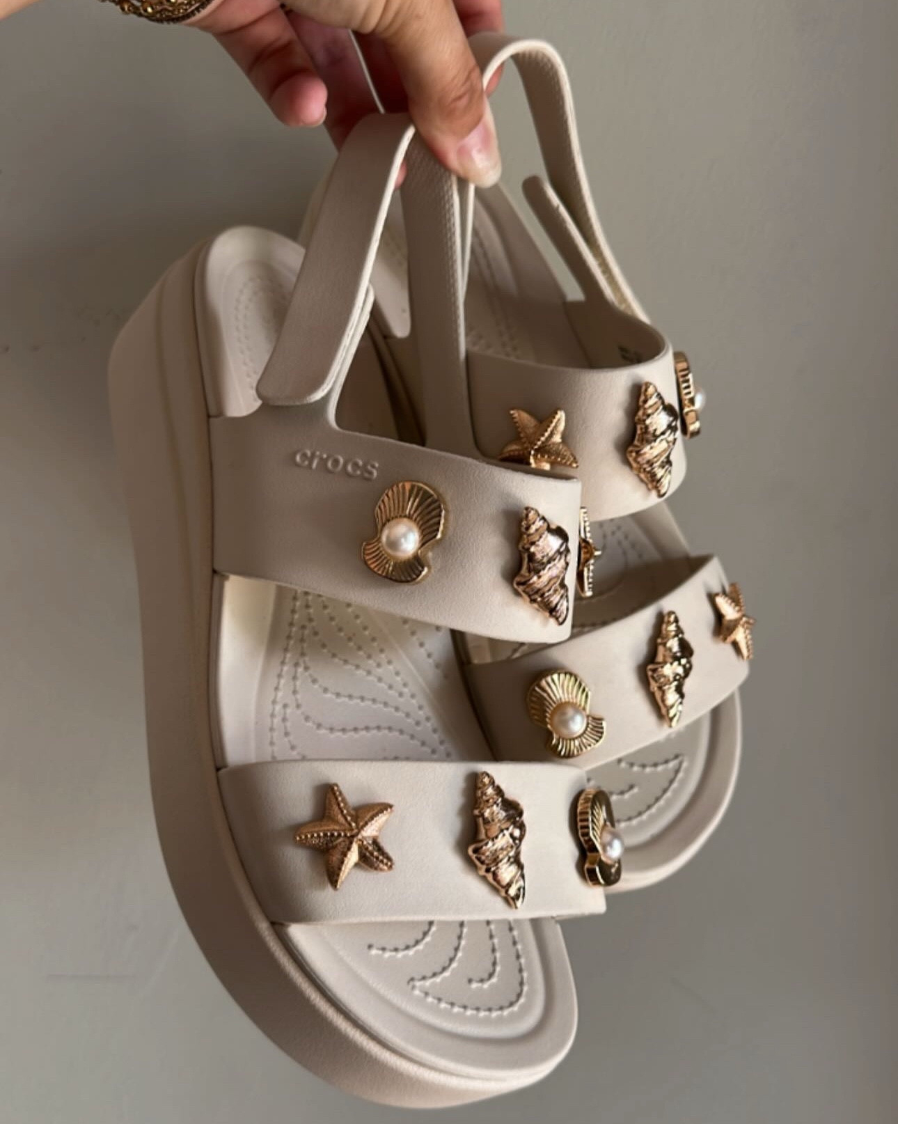 The cutest platforms for summer! Croc sandals and added the cutest beachy giblets! 

#LTKFindsUnder100 #LTKTravel #LTKShoeCrush