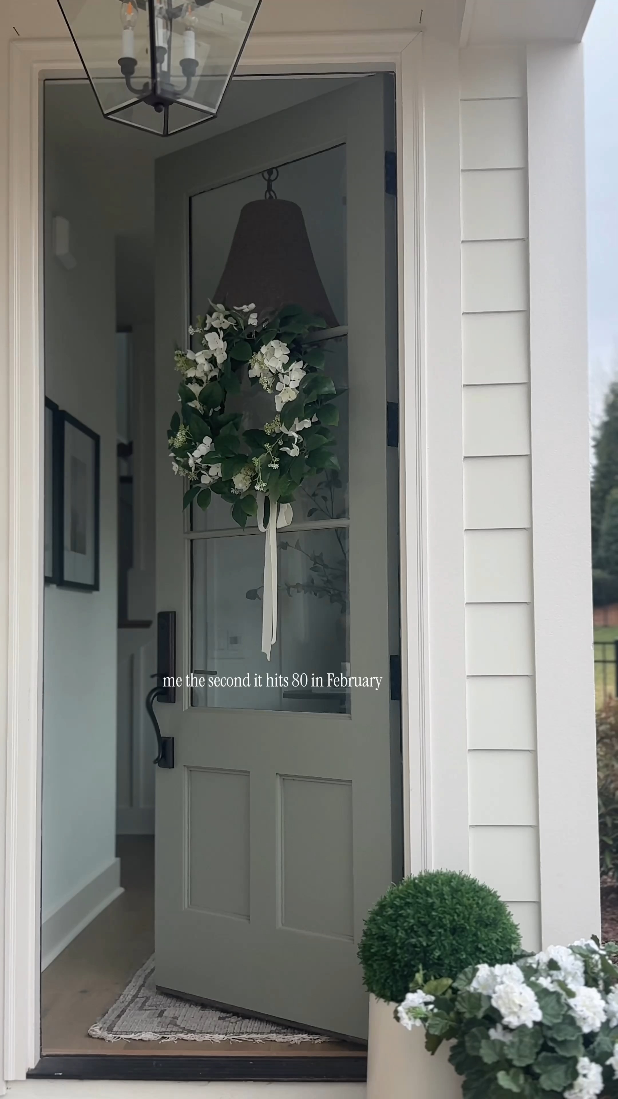 Me the second it hits 80 in February 🌿

Out with winter, in with early spring porch decor. I swapped in a fresh floral wreath, simple greenery, and neutral entry styling to brighten up our front door without going full pastel.

If you’re craving a spring refresh but it’s technically still winter… this is your sign.

Linking my front door wreath, porch planters, greenery, and entryway decor in LTK 🤍

#springporch #frontdoordecor #earlyspringdecor #neutralhome #seasonalrefresh #porchstyling #ltkhome #entrywayinspo #southernhome #classicdecor 

 #LTKSeasonal #LTKHome
