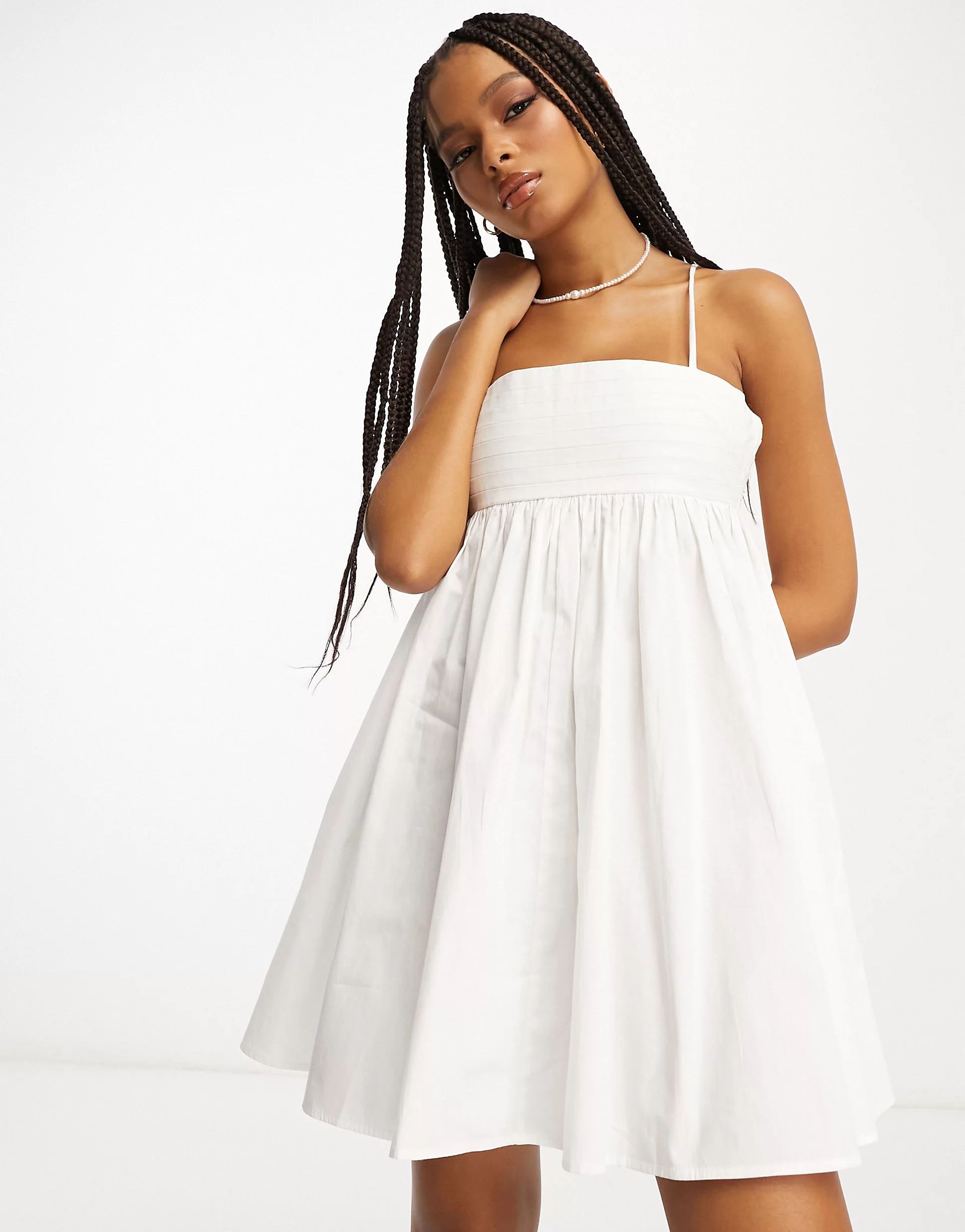 ASOS DESIGN cotton pleat bust babydoll mini sundress in white | ASOS (Global)