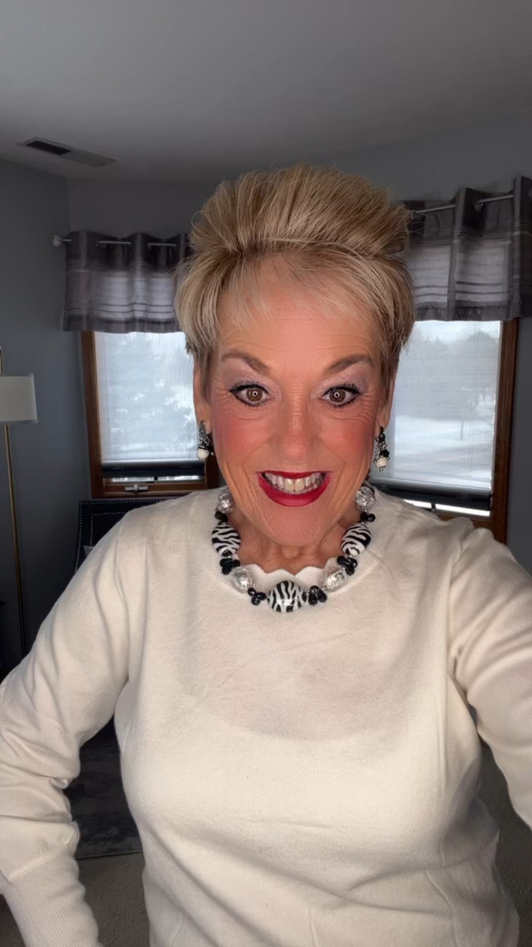 Crew Neck Scalloped Trim Sweater
Faux Suede Cropped Bomber Jacket
Black Jeans White Stitching
Zebra Booties