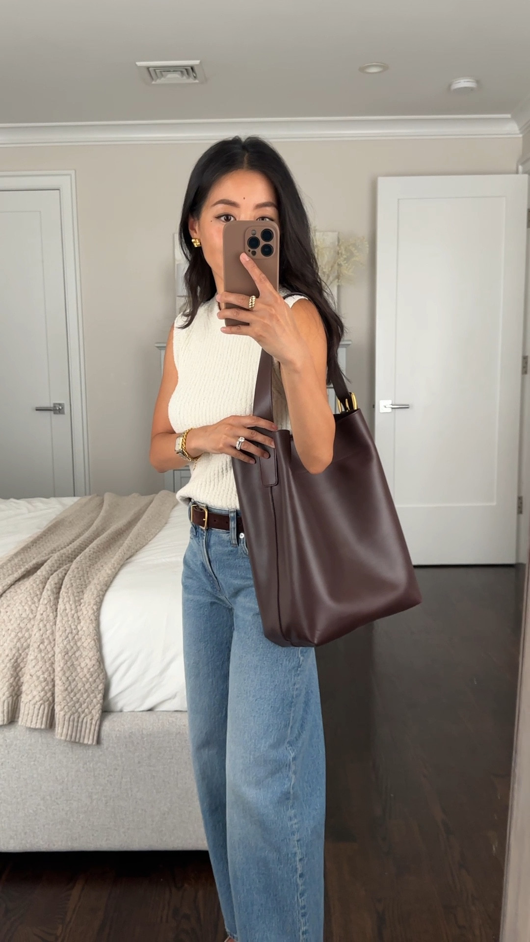 Madewell fall 

• simple Suede belt xxs. Love this color and also have the classic black which I wear often 

•Bucket tote - a chic quiet luxury work tote with nice slouch and fits a laptop easily. This is the color “Chocolate Raisin” - gorgeous brown burgundy. I cut the strap a little shorter and you can’t tell 


• Madewell Perfect Vintage wide leg jeans size 24 petite - a full length version of my favorite wide leg crop jeans so flattering and the petite length is perfect if I wanted to wear with flats or sneakers Size 24 petite measures 12.75” across waist, 9.5” rise, 26.75” inseam. 

•textured boucle Sweater tank xxs. An elegant, cozy transitional piece 

•Ann Taylor shoes (old; linked a similar style)

#LTKworkwear #LTKitbag #LTKSeasonal