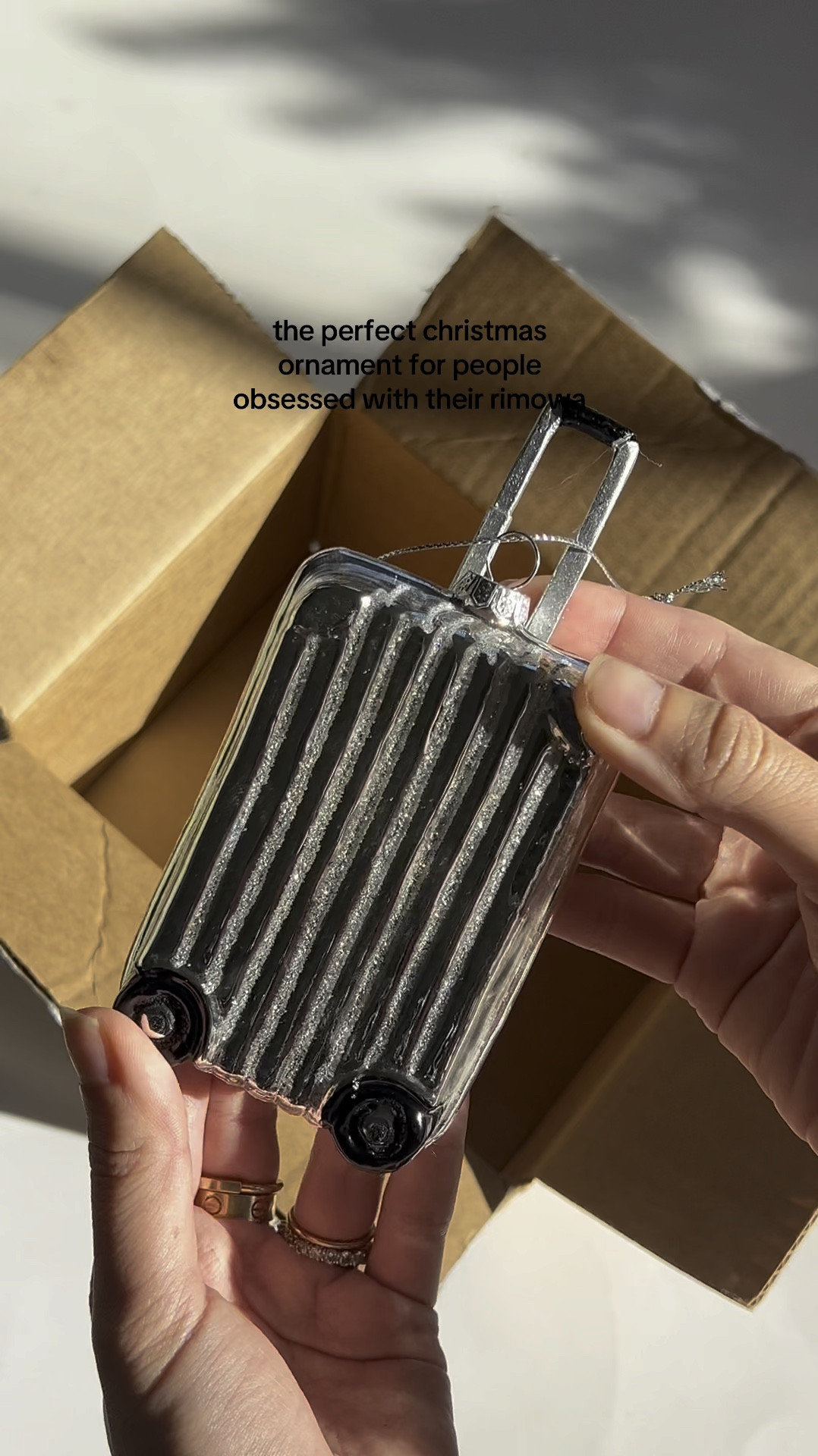 I am people obsessed with their Rimowa ✈️ RUN DON’T WALK TO #christmasdecor #christmasornaments #travel 