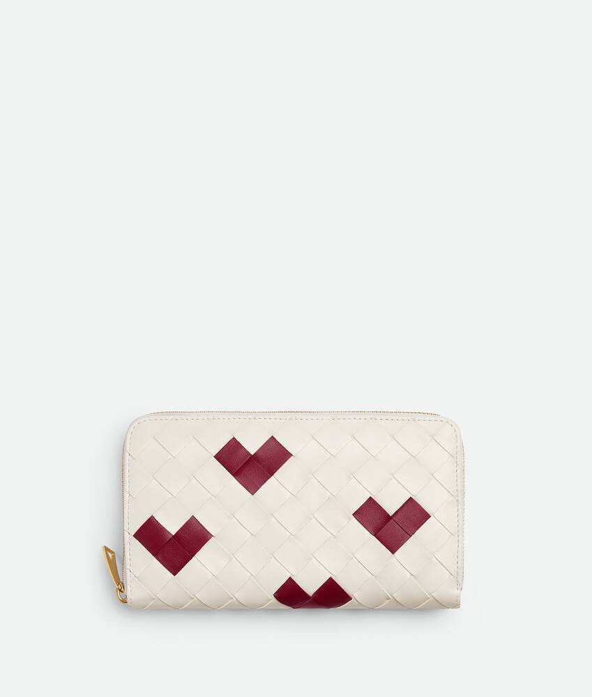 Bottega Veneta® Women's Intrecciato Zip Around Wallet in Chalk/dark red. Shop online now. | Bottega Veneta