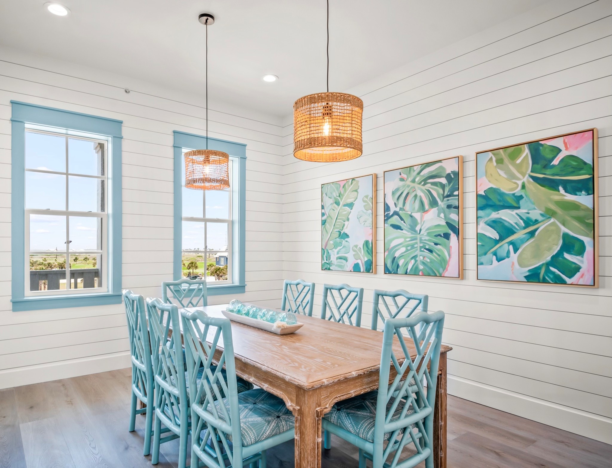 A tropical twist on timeless style! 🌴 🌊
This dining space is all about thoughtful layers: the Brighton dining table from Sarreid anchors the room, while the Ballard Designs Dayna chairs got a fresh Benjamin Moore makeover (hello, Kensington Green 710!). We had them reupholstered in Premier Prints Tezza Drizzle for just the right pop of print. And the finishing touch? Of course tropical palm art by Urban Garden Prints that ties it all together.

#LTKSummerEdit #LTKFamily #LTKHome