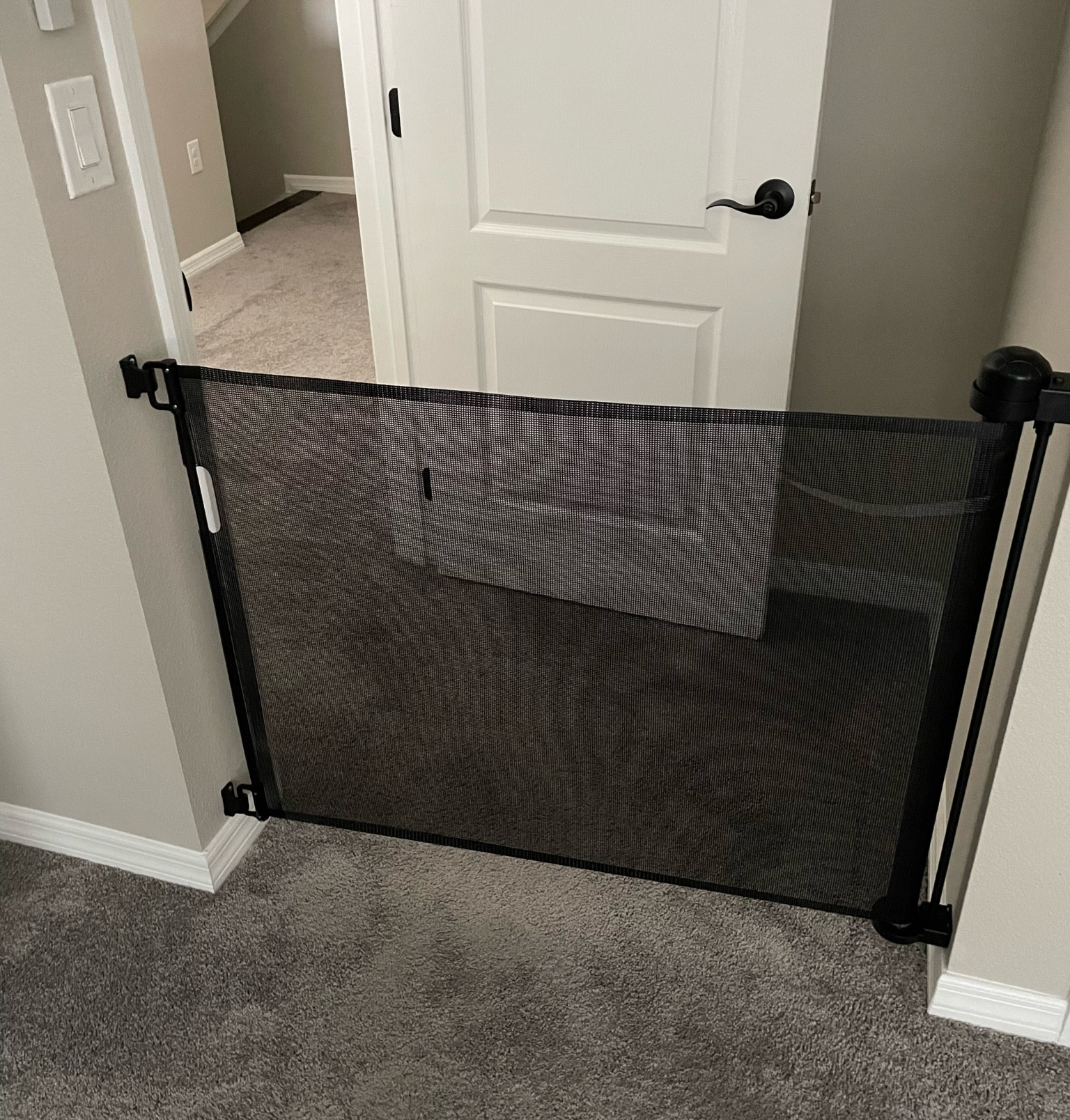 Baby and dog gate. We use this for our 3 year old so he can’t leave his room and get to the stairs. It’s perfect! It’s nice we can retract it so it’s not in the way during the day  

#LTKfamily #LTKbaby #LTKkids