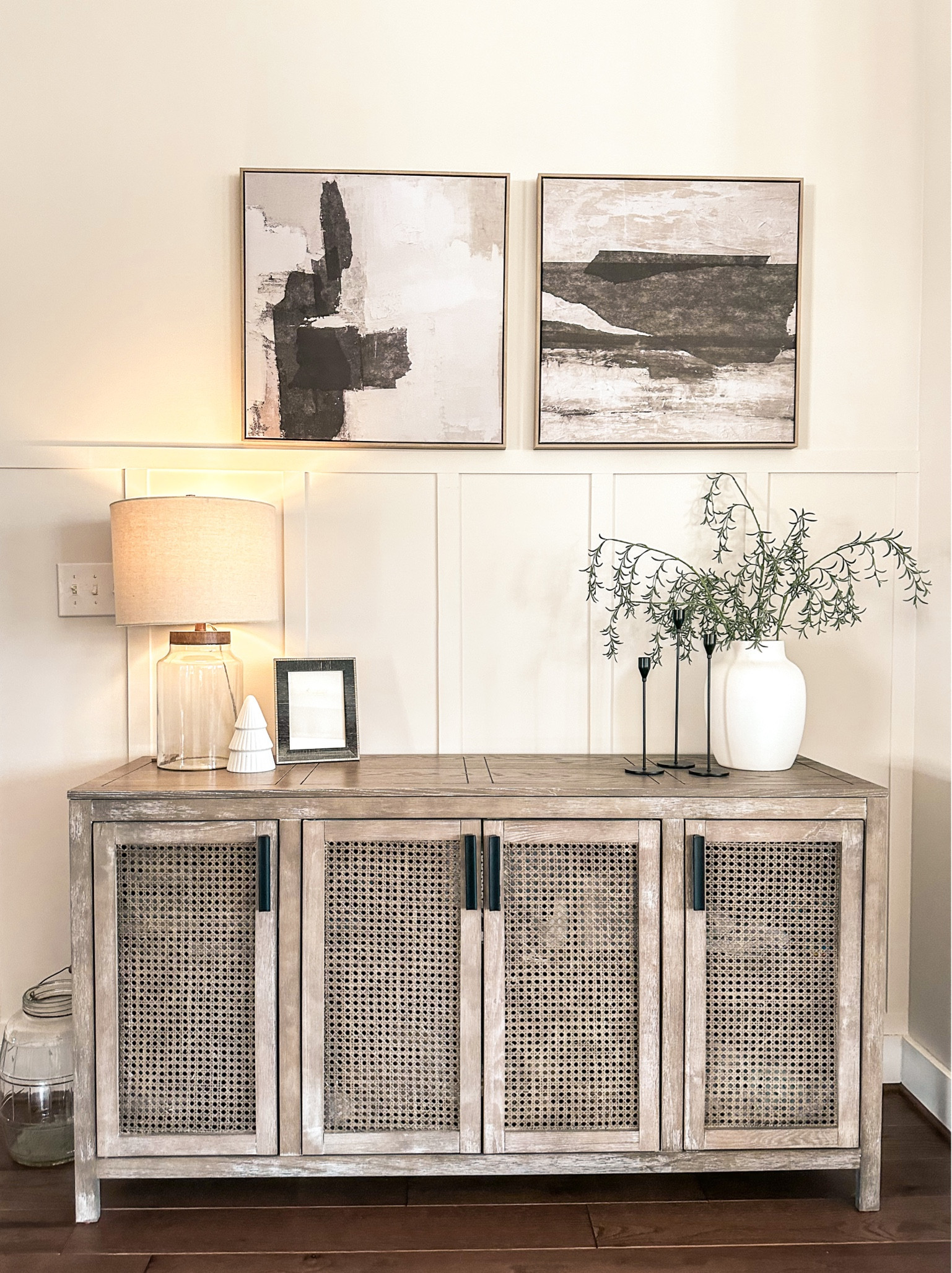 Wayfair again for the win!! We purchased two of these cabinets for our family room to use as additional storage for games, toys, etc. 

Also snagged these canvas prints from Target. They are simple, sleek and work great in this space.
#homedecor #homestorage 

#LTKhome
