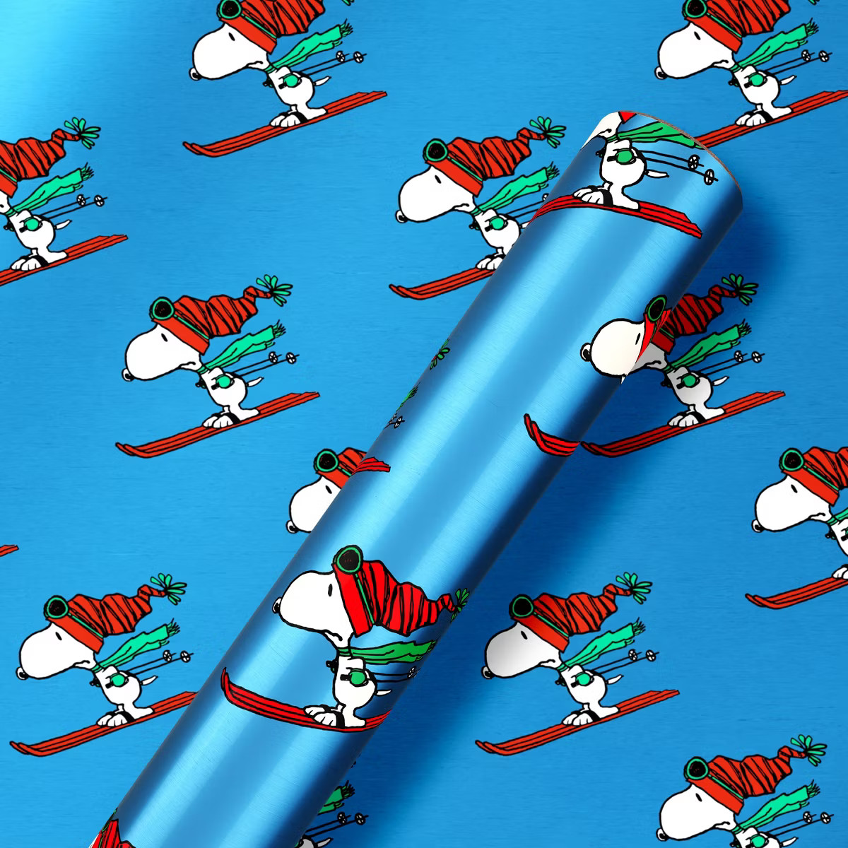American Greetings 30" 25 sq ft Metallized Peanuts Snoopy Skiing on Blue Gift Wrap | Target