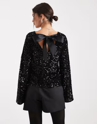Pieces backless sequin top with satin bow back in black | ASOS (Global)