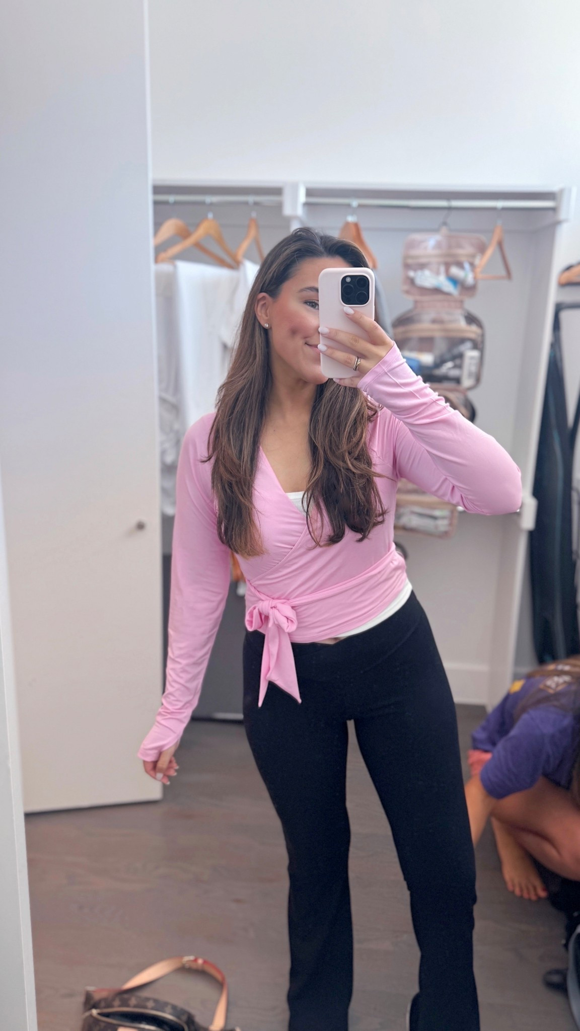 Light pink wrap top and black flare leggings! Casual athleisure outfit for running errands or Pilates class 

#LTKActive #LTKFindsUnder50