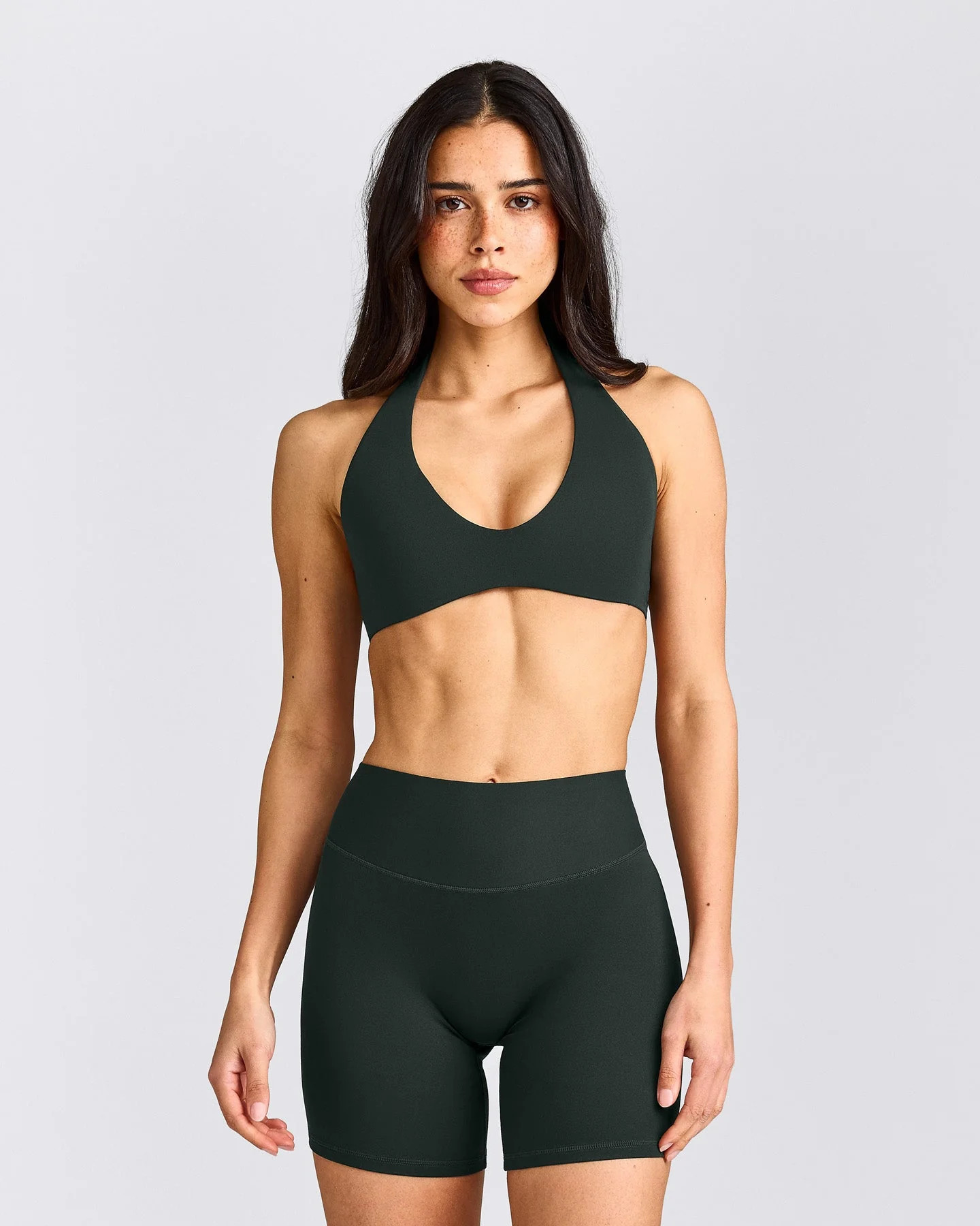 SoftMotion\u2122 Minimal Halter Neck Bralette with Gray Logo 
 Emerald Noir | Oner Active (UK / US)