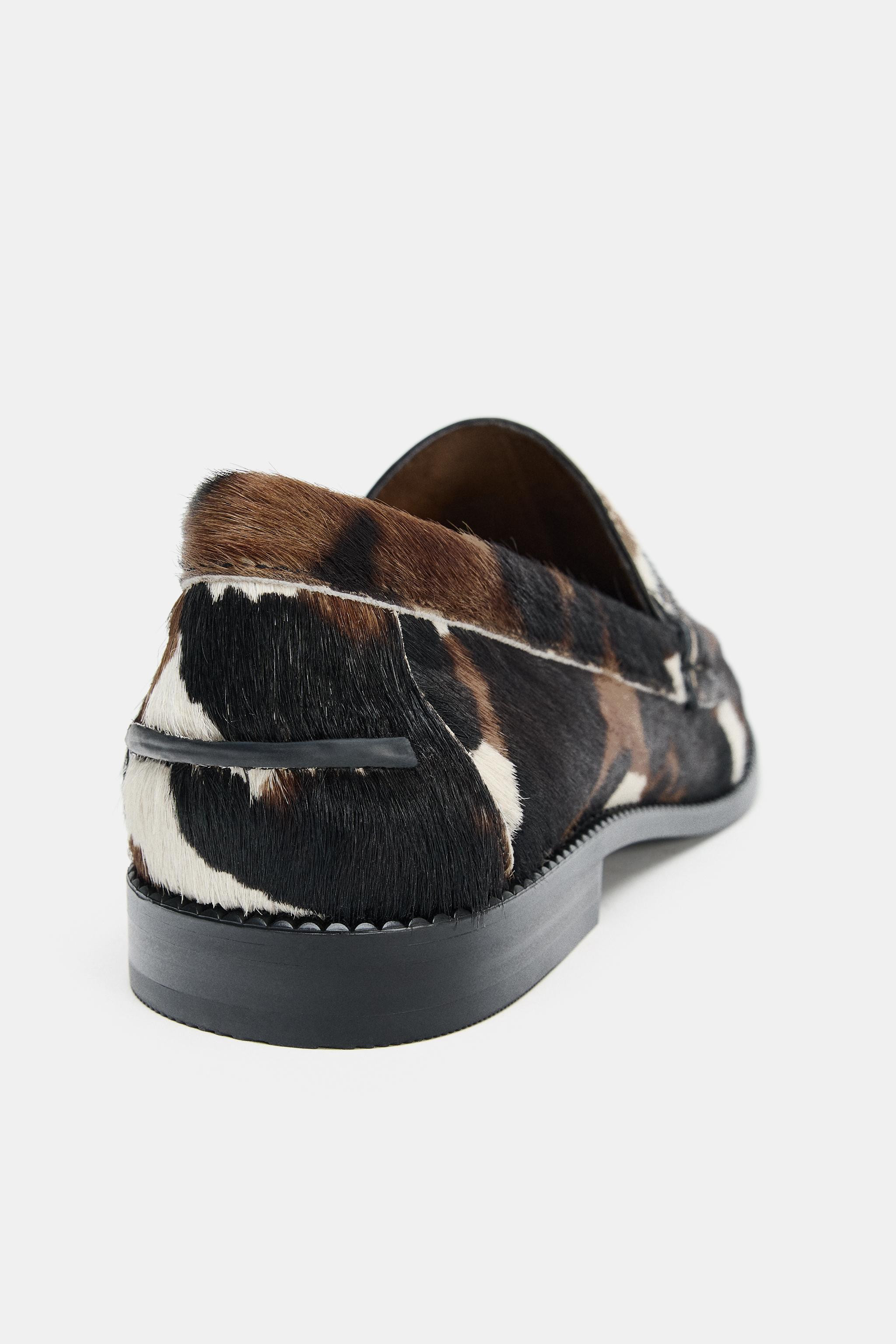 Flat moccasin-style shoes in leather with fur. Animal embossed upper. Saddle and high vamp at the... | Zara US