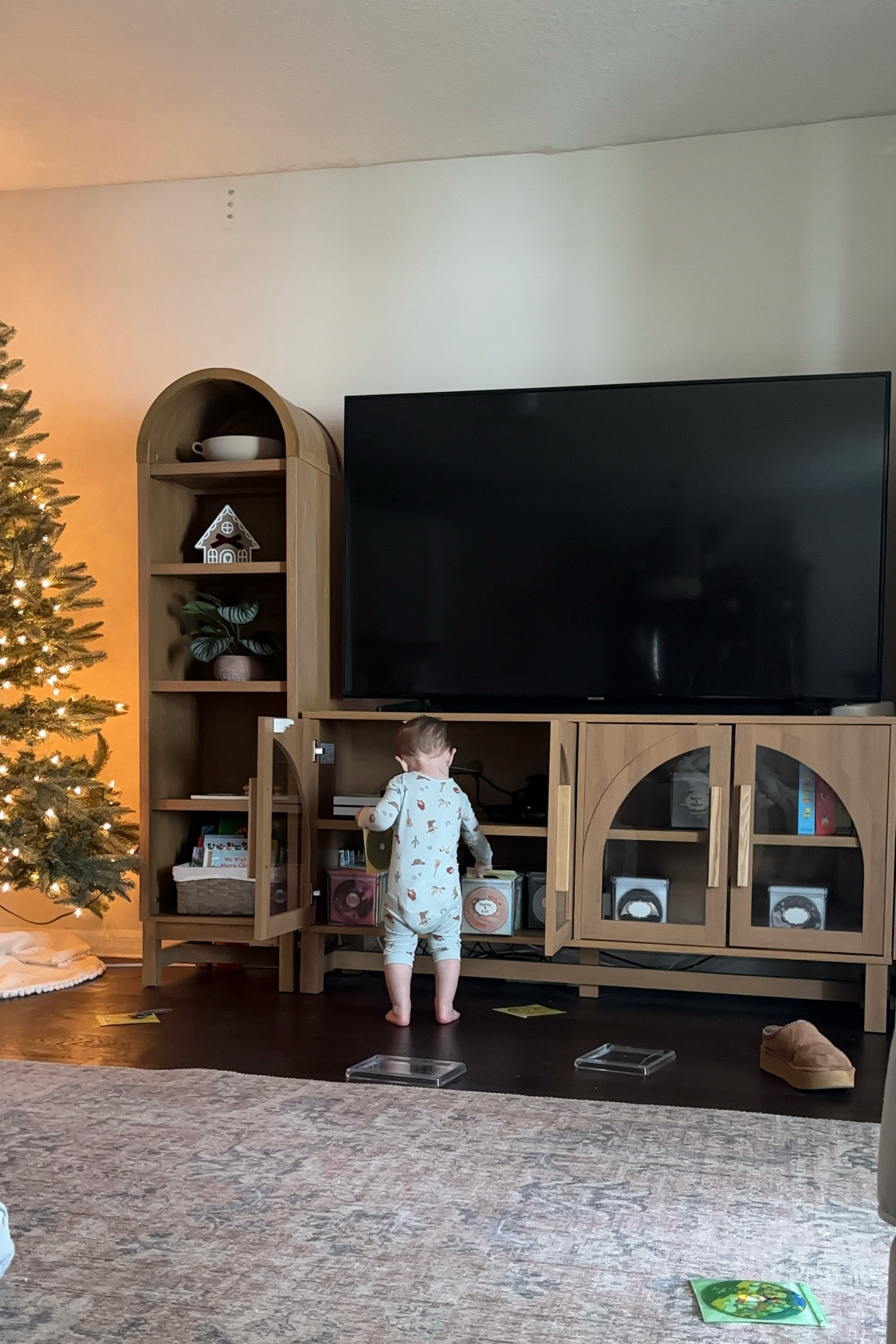 Our tv stand set up
We have a 65 inch tv. 
tv stand & arched bookshelves on each side all from walmart!! They also come in black!! 

Bhg arched bookshelf. Bhg home
 #walmarthome @walmart

#LTKHoliday #LTKHome #LTKSeasonal