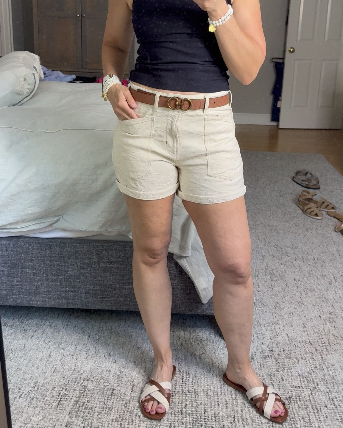 This is one of my ultimate favorite belts of the season. I love the double horseshoe and it is reversible from brown to black. I ordered a size medium, which is true to size. Pairing with a pair of anthropology shorts that are super soft also true to sizeand a super comfortable soft top.

#LTKActive #LTKSeasonal #LTKStyleTip