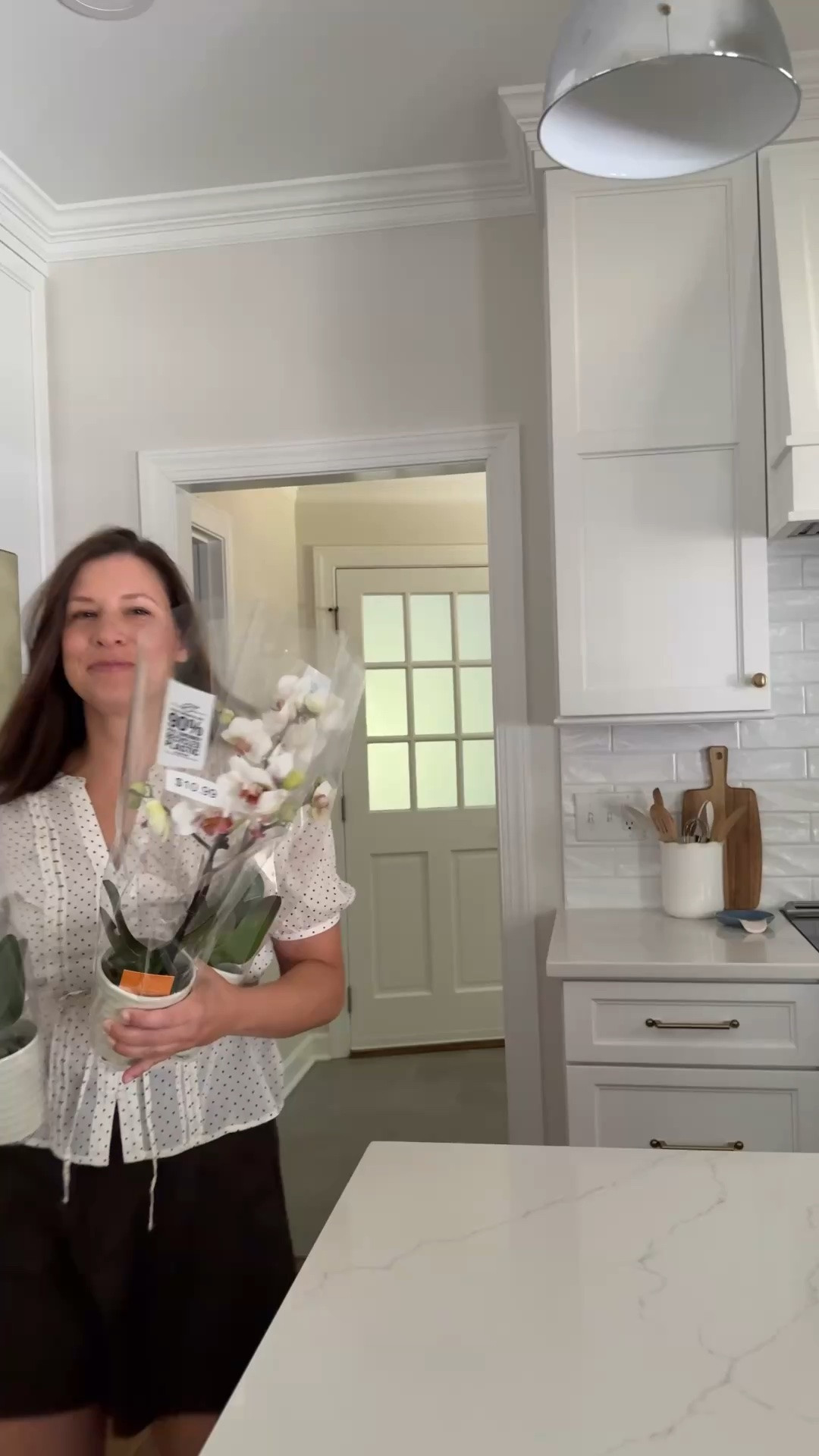 Learn how to make a simple orchid arrangement that instantly elevates your space. This easy tutorial focuses on using the right size container for a fuller, more polished look. Ideal for living rooms, bedrooms, and entry tables.

#LTKHome