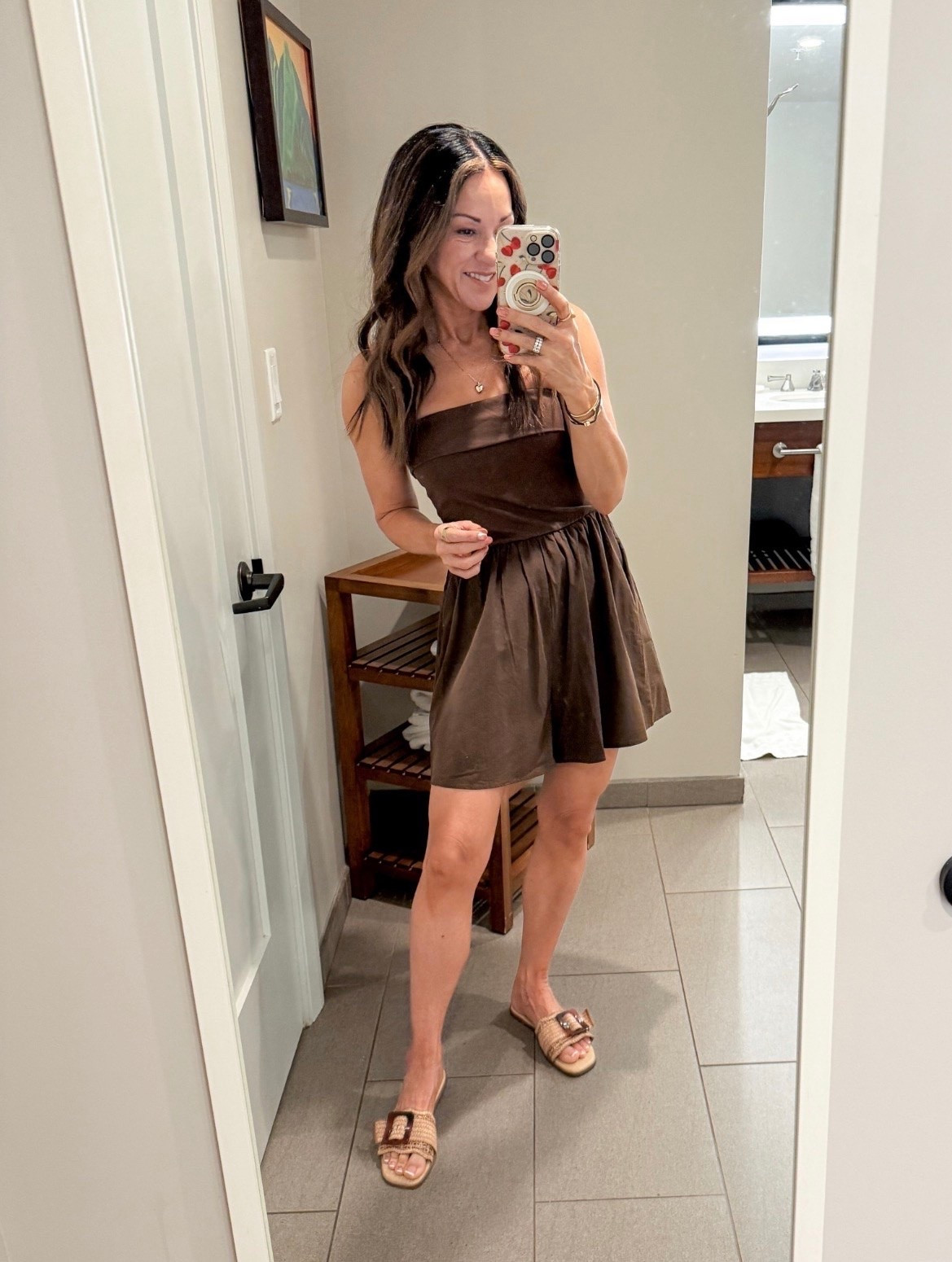 This chocolate brown romper is one of those pieces that makes getting dressed so easy. It has the look of a chic mini dress with the comfort of built in shorts, making it perfect for vacation, date nights, or summer evenings out. I paired it with woven buckle sandals for an effortless, elevated look.

Brown romper, chocolate brown outfit, summer romper, vacation outfit, date night outfit, resort wear, woven sandals, petite friendly fashion, elevated summer style, Amazon fashion find, effortless outfit, EverydayHolly

#LTKootd #LTKSeasonal #LTKPetite