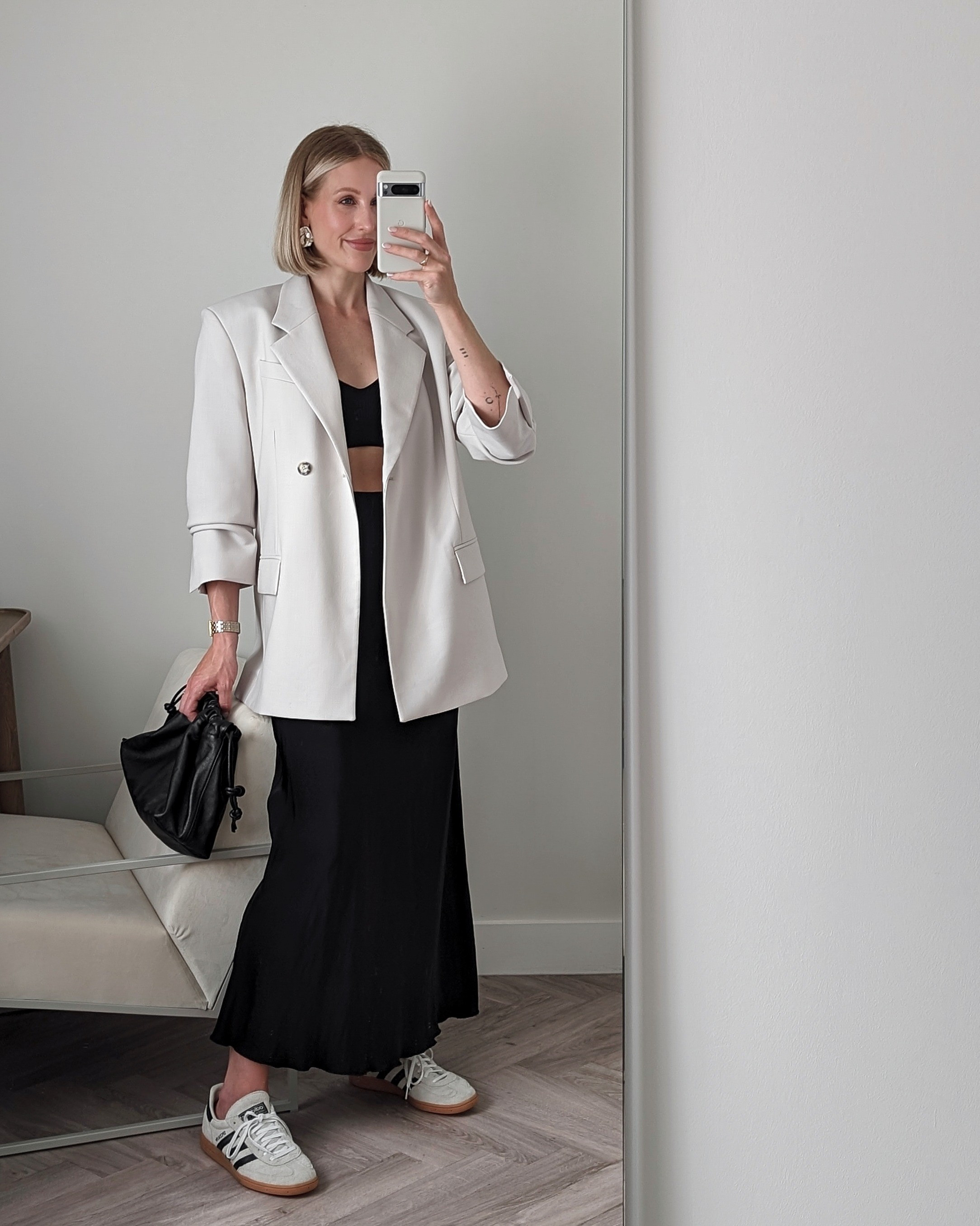 Smart casual blazer outfit styled with satin maxi skirt and Adidas handball Spezial trainers 🤍

#LTKstyletip #LTKshoecrush #LTKU