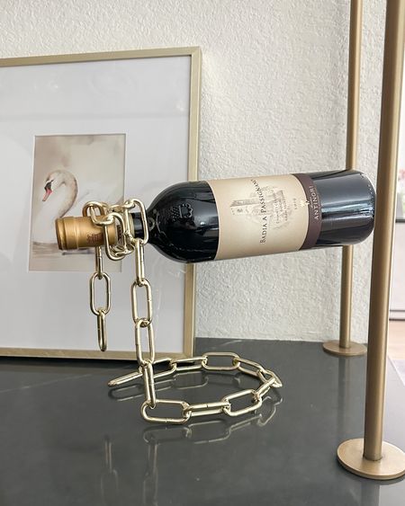 Such a fun Amazon find! This gold chain link wine holder is perfect for a bar area or wherever you have wine displayed!

#LTKhome #LTKunder50 #LTKstyletip
