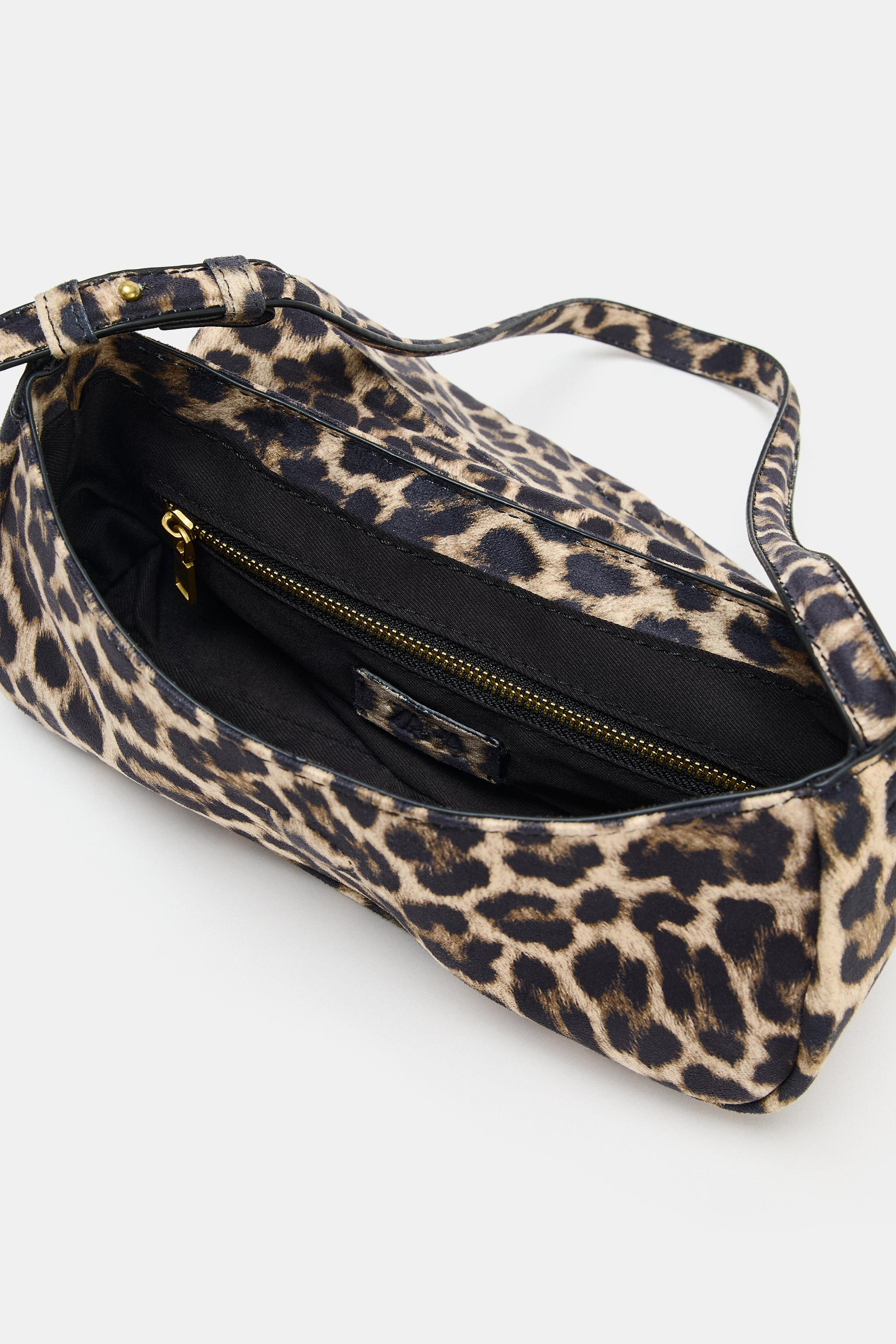 Shoulder bag. Printed exterior. Adjustable shoulder strap with metallic appliqu\u00e9s. Interior ... | Zara US