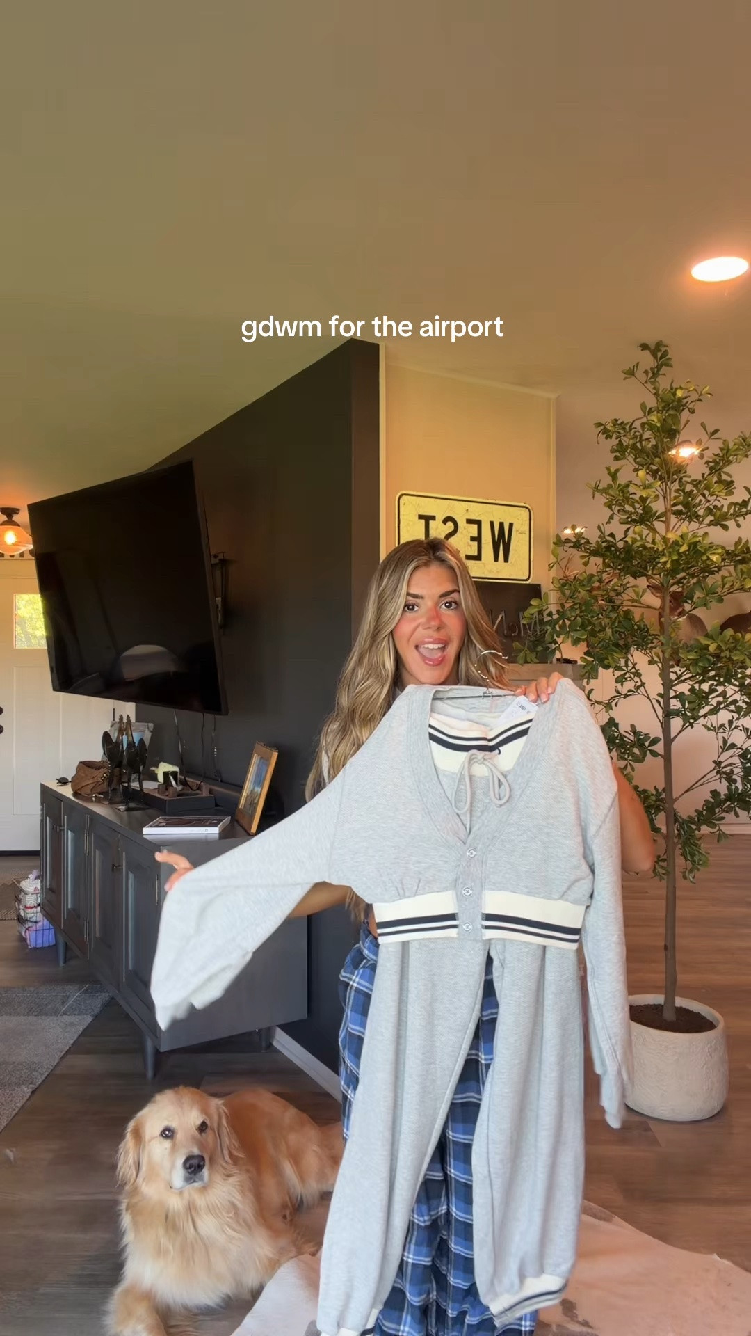 wearing an xs set 
small plaid pants and small tee 
carry-on size luggage!
